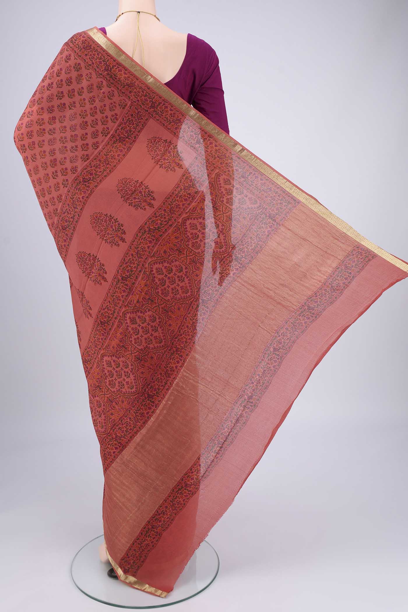 Flat view of Coral Mysore Crepe Saree with Floral Print on the body and Zari Border. 