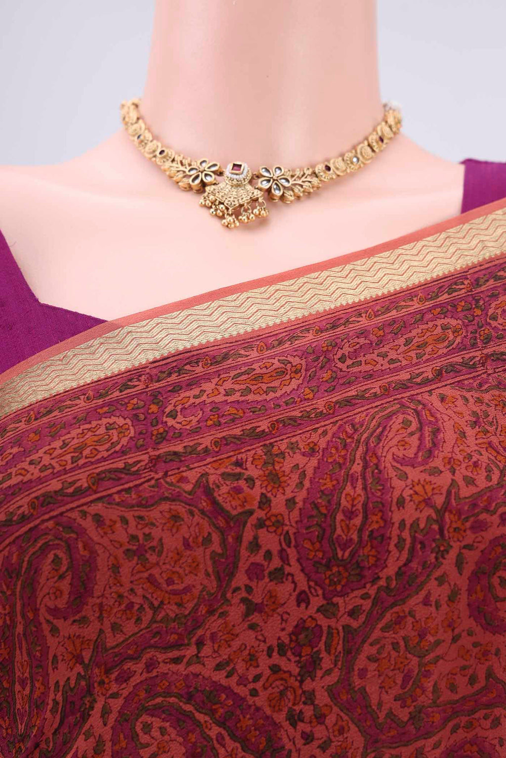 Border image of Peach Mysore Crepe Saree with Floral Print on the body and Zari Border. 