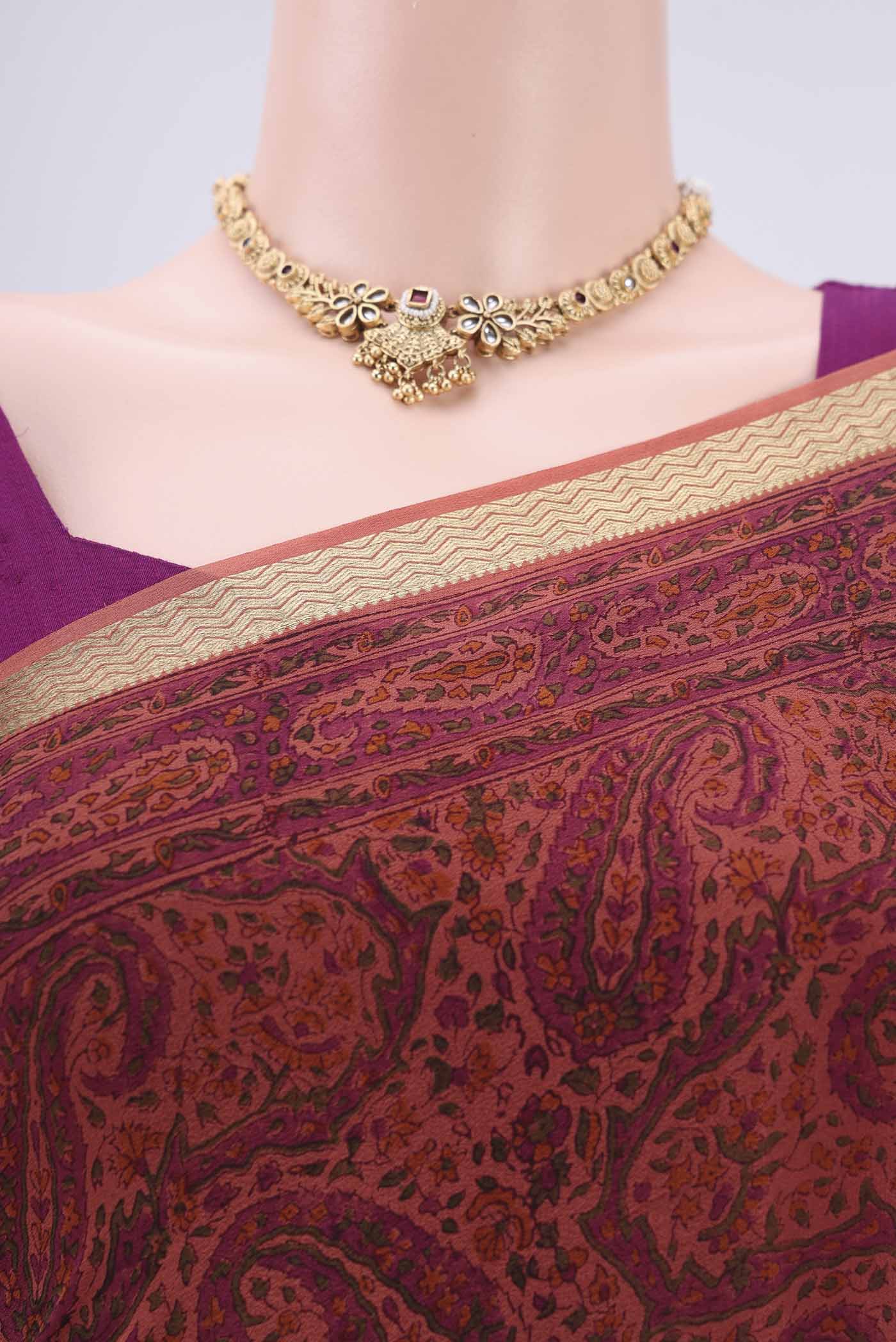 Border image of Peach Mysore Crepe Saree with Floral Print on the body and Zari Border. 