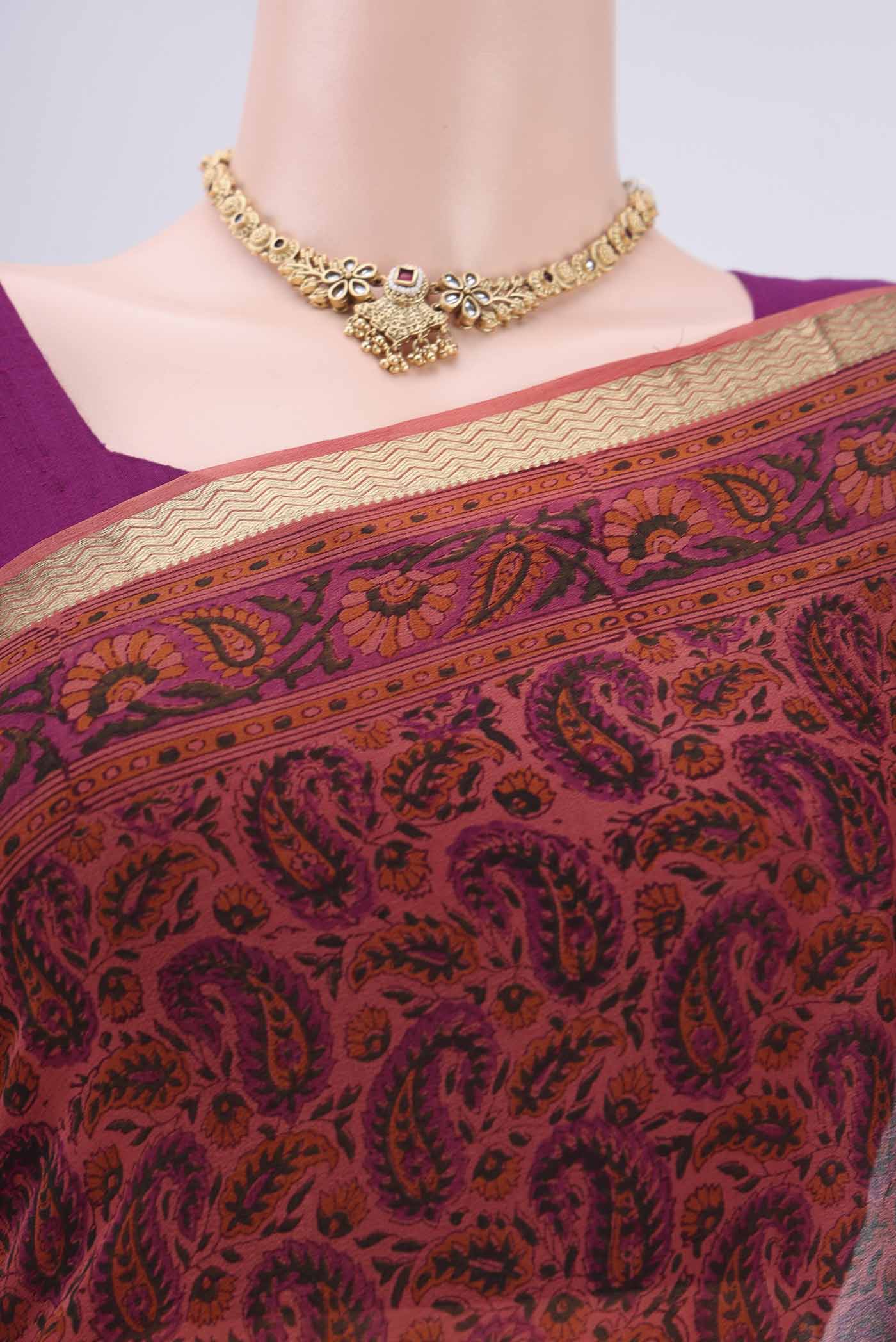 Border image of Peach Mysore Crepe Saree with Floral Print on the body and Zari Border. 