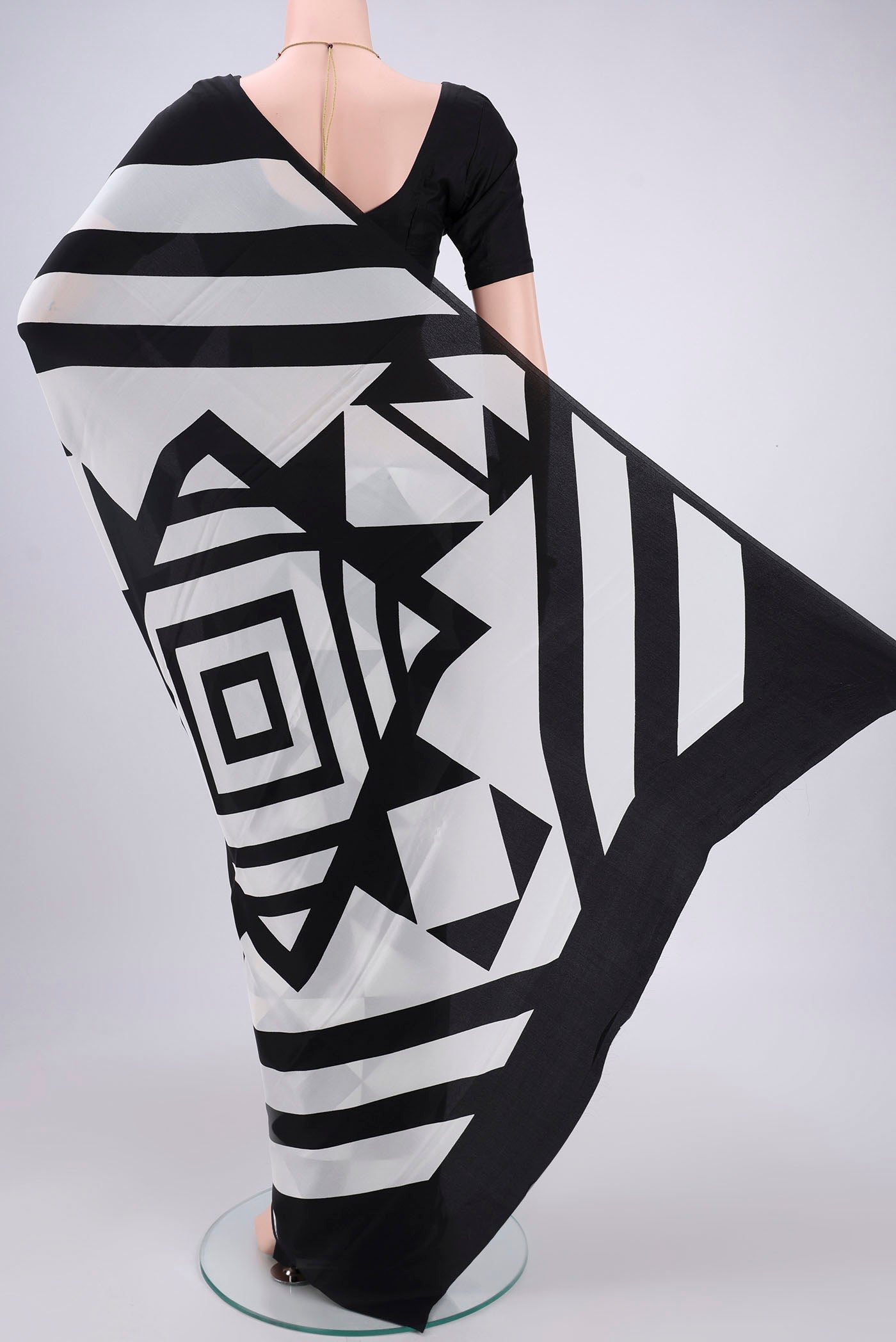 Flat view of Black Mysore Crepe Saree with Floral Print on the body and Without Border. 