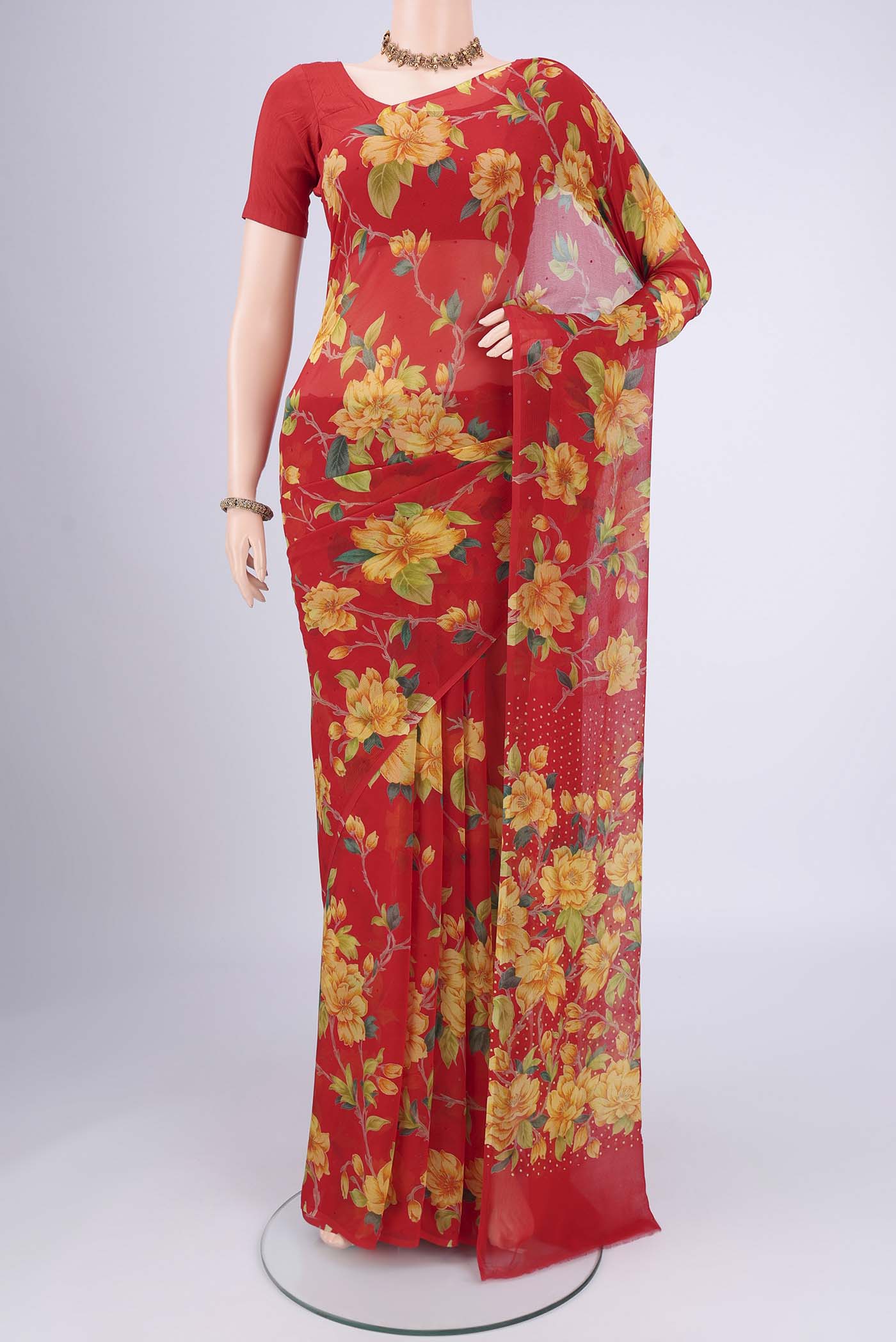 Red Mysore Chiffon Saree with Floral Print on the body and Without Border.  displayed on a mannequin