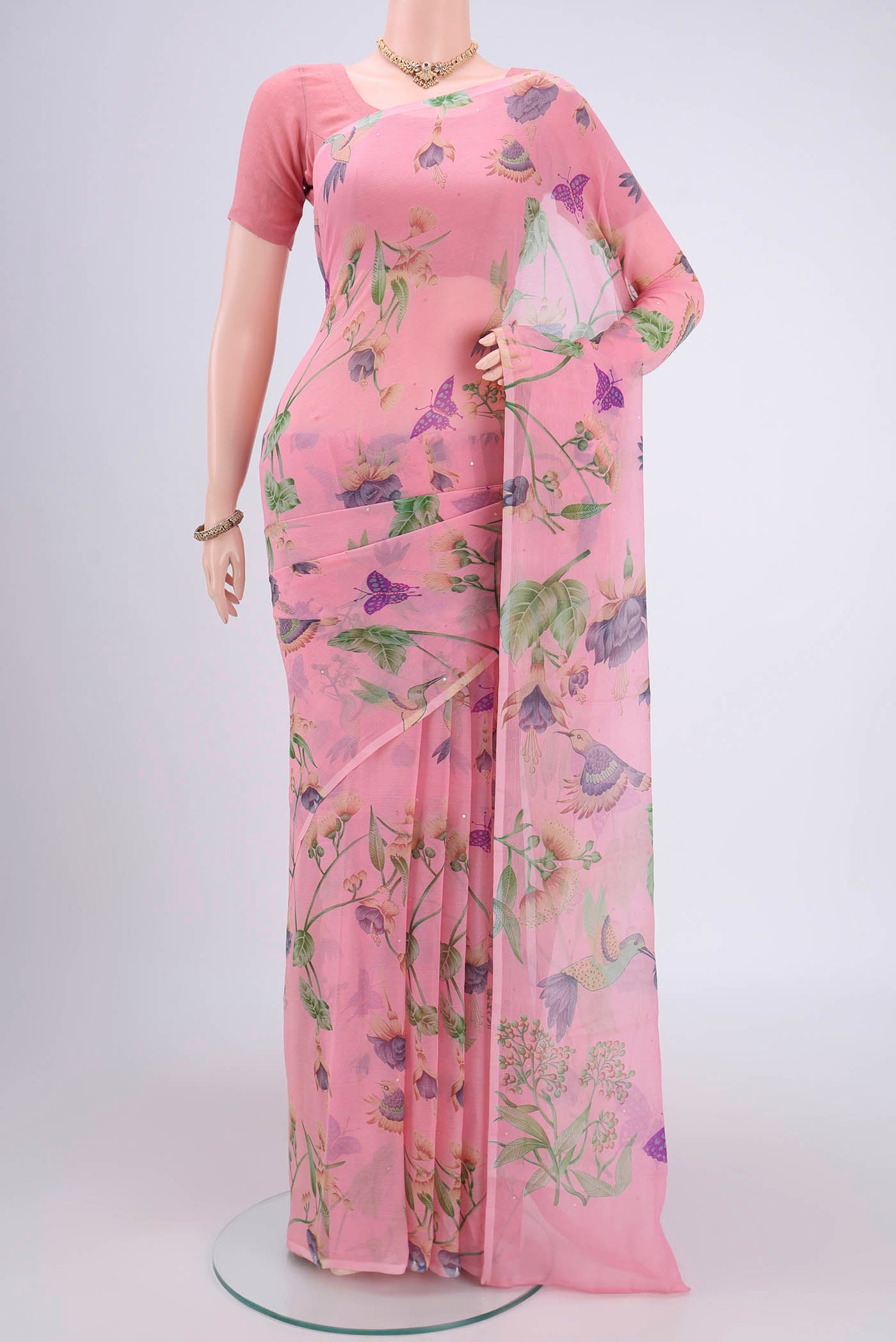 Rose pink Mysore Chiffon Saree with Floral Print on the body and Satin Border.  displayed on a mannequin