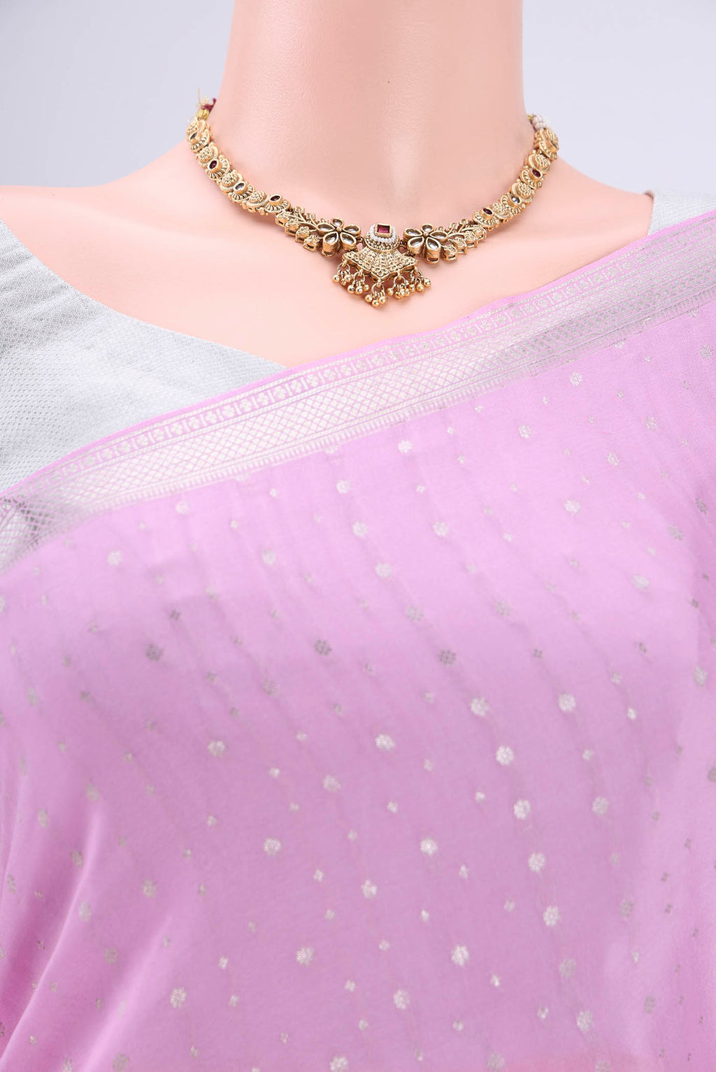 Border image of Pink Mysore Crepe Saree with Zari Butta on the body and Zari Border. 