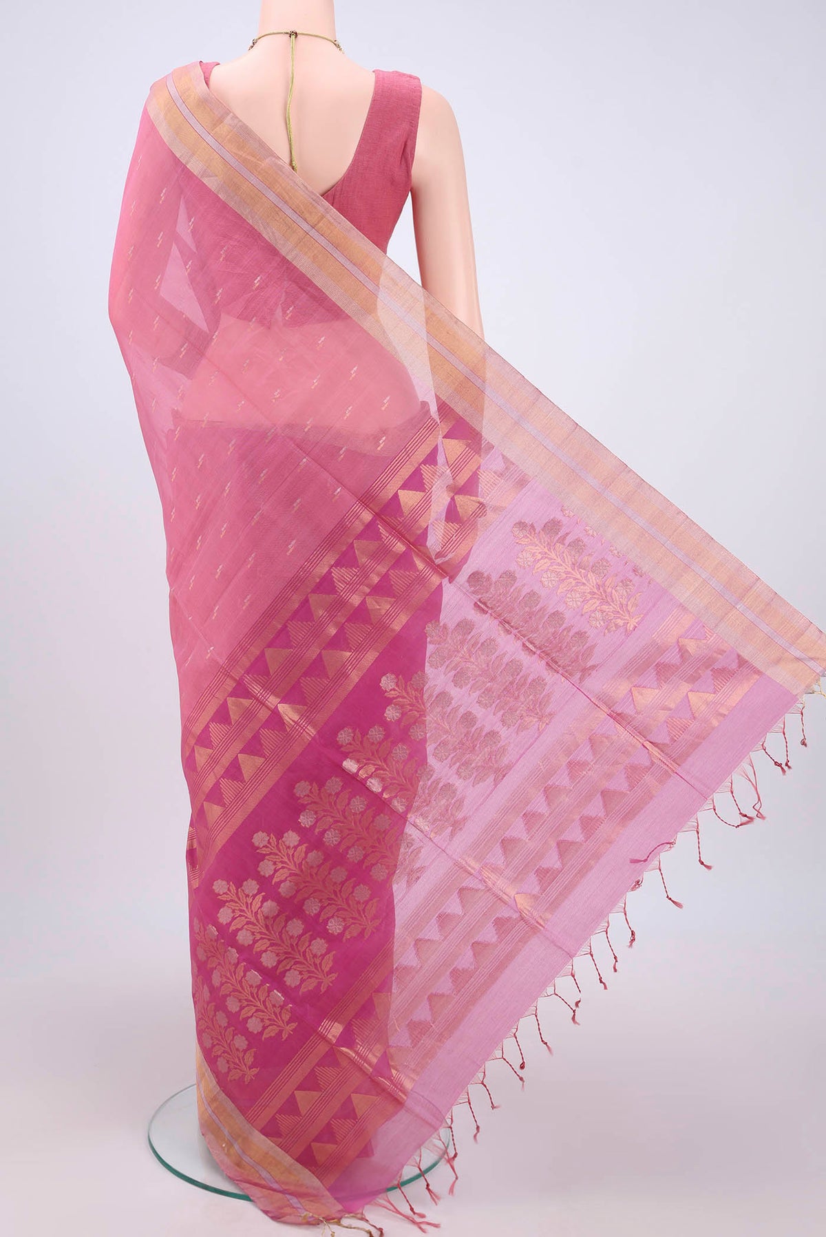Flat view of Rose pink Silk Cotton Saree with Zari Butta on the body and Zari Border. 