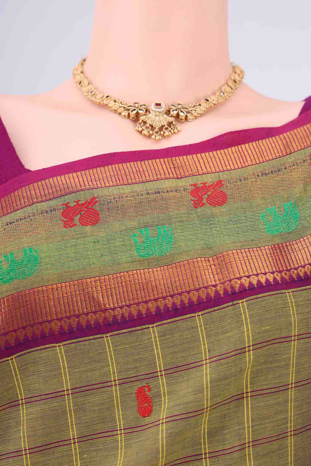 Border image of Mehandi Green Kanchi Cotton Saree with Checked design on the body and Temple Border. 