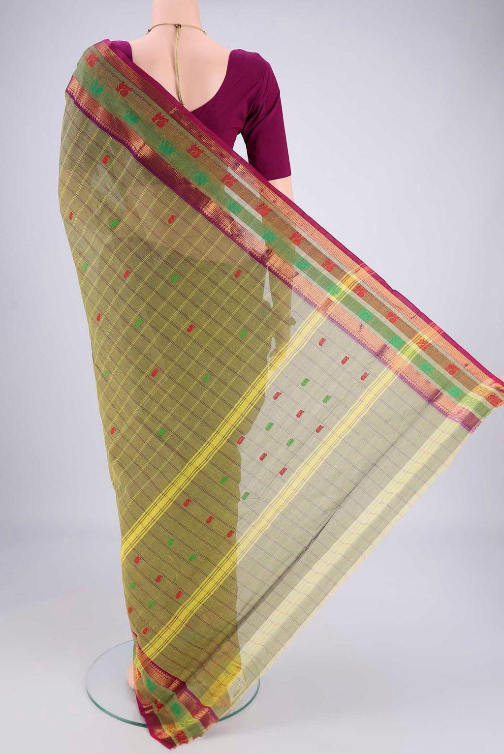 Flat view of Mehandi Green Kanchi Cotton Saree with Checked design on the body and Temple Border. 