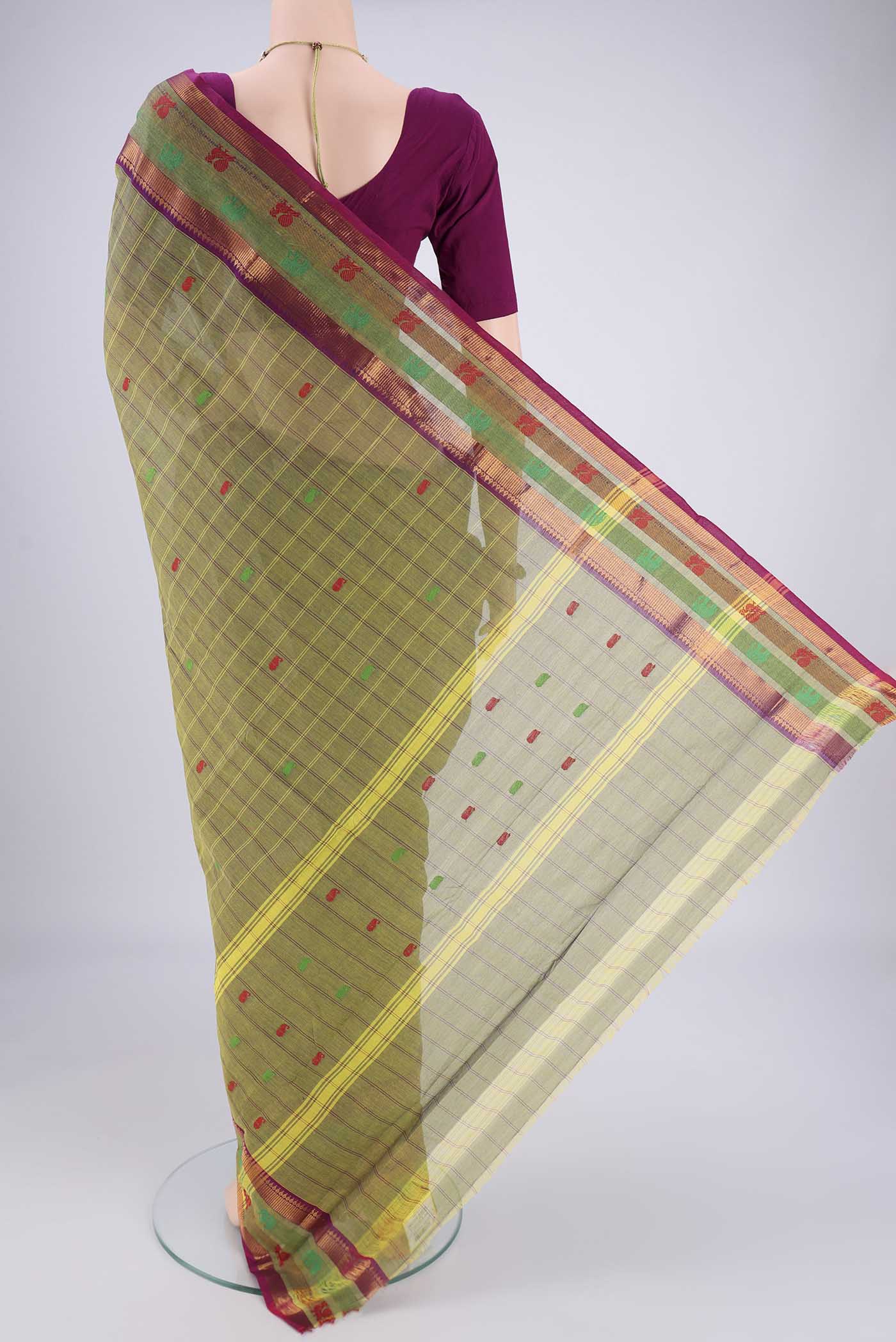 Flat view of Mehandi Green Kanchi Cotton Saree with Checked design on the body and Temple Border. 