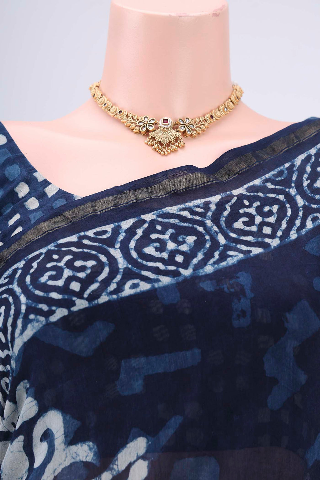 Border image of Indigo Chanderi Silk Saree with Batik Print on the body and Zari Border. 
