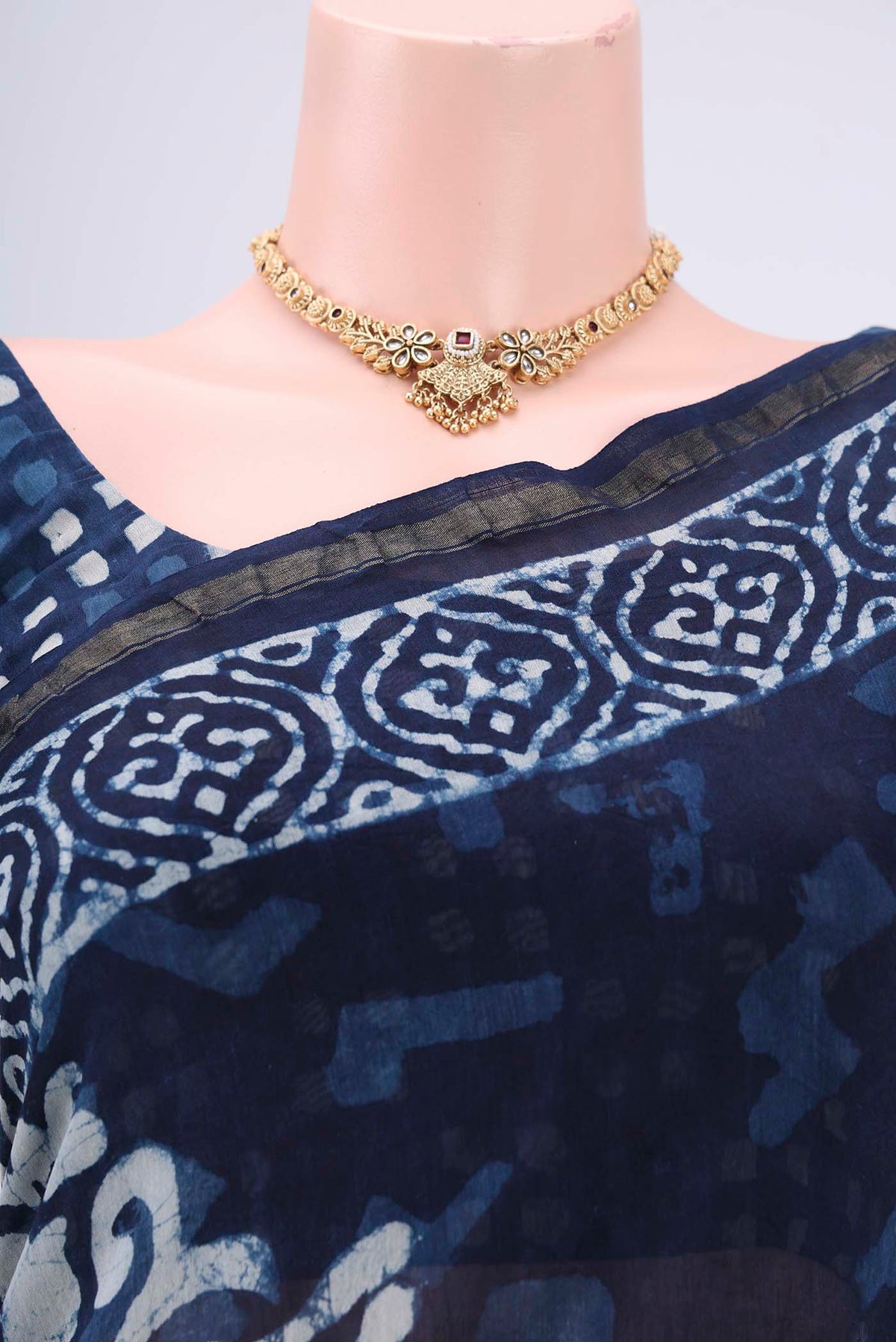 Border image of Indigo Chanderi Silk Saree with Batik Print on the body and Zari Border. 