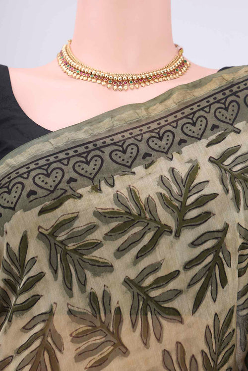 Border image of Beige Chanderi Silk Saree with Batik Print on the body and Zari Border. 