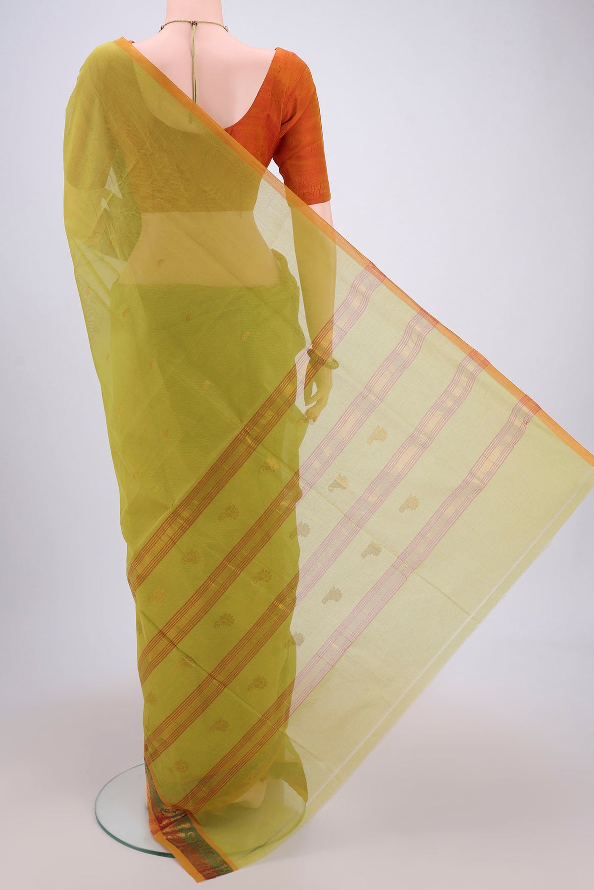 Flat view of Light Green Venkatagiri Cotton Saree with Zari Butta on the body and Zari Border. 