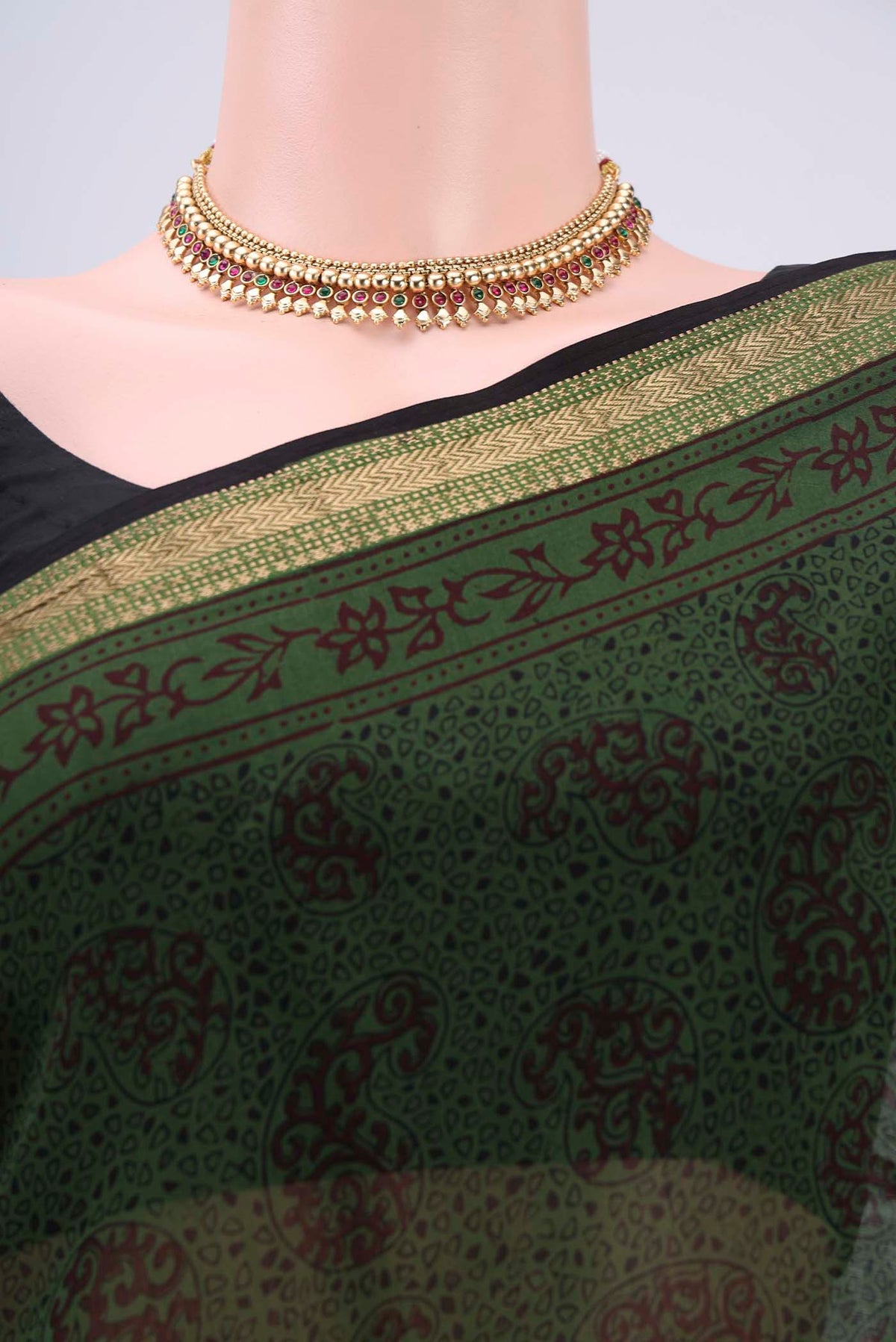 Border image of Red Maheshwari Silk Cotton Saree with Printed design on the body and Zari Border. 