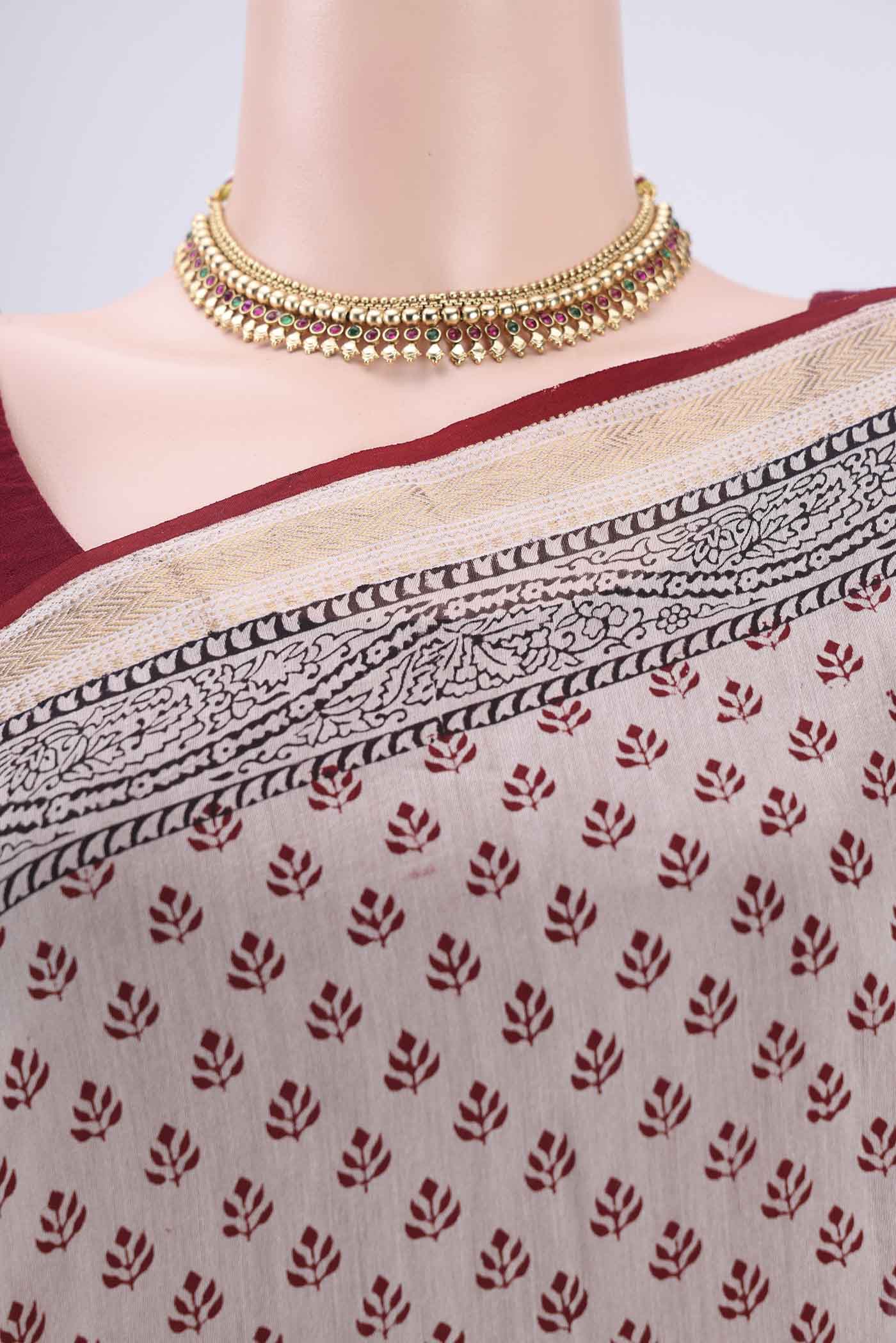 Border image of Beige Maheshwari Silk Cotton Saree with Printed design on the body and Zari Border. 