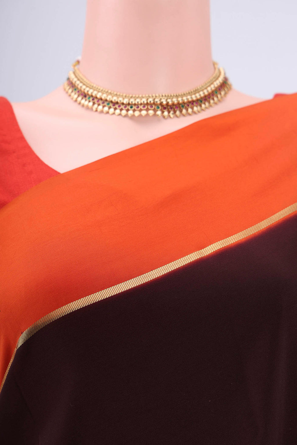 Border image of Pure Silk Pure Zari Brown Mysore Crepe Saree with Plain Body and Zari Border. 