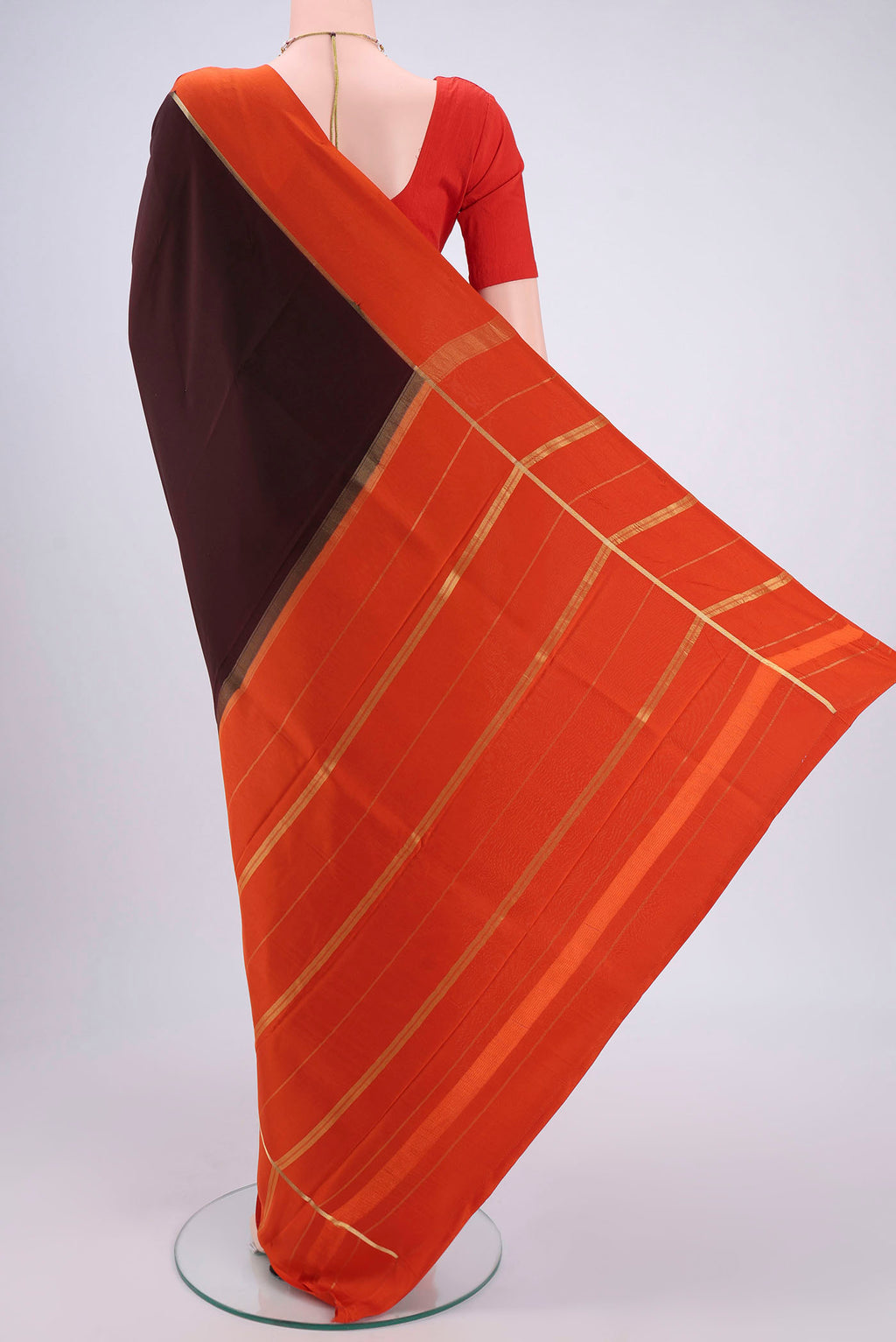 Flat view of Pure Silk Pure Zari Brown Mysore Crepe Saree with Plain Body and Zari Border. 