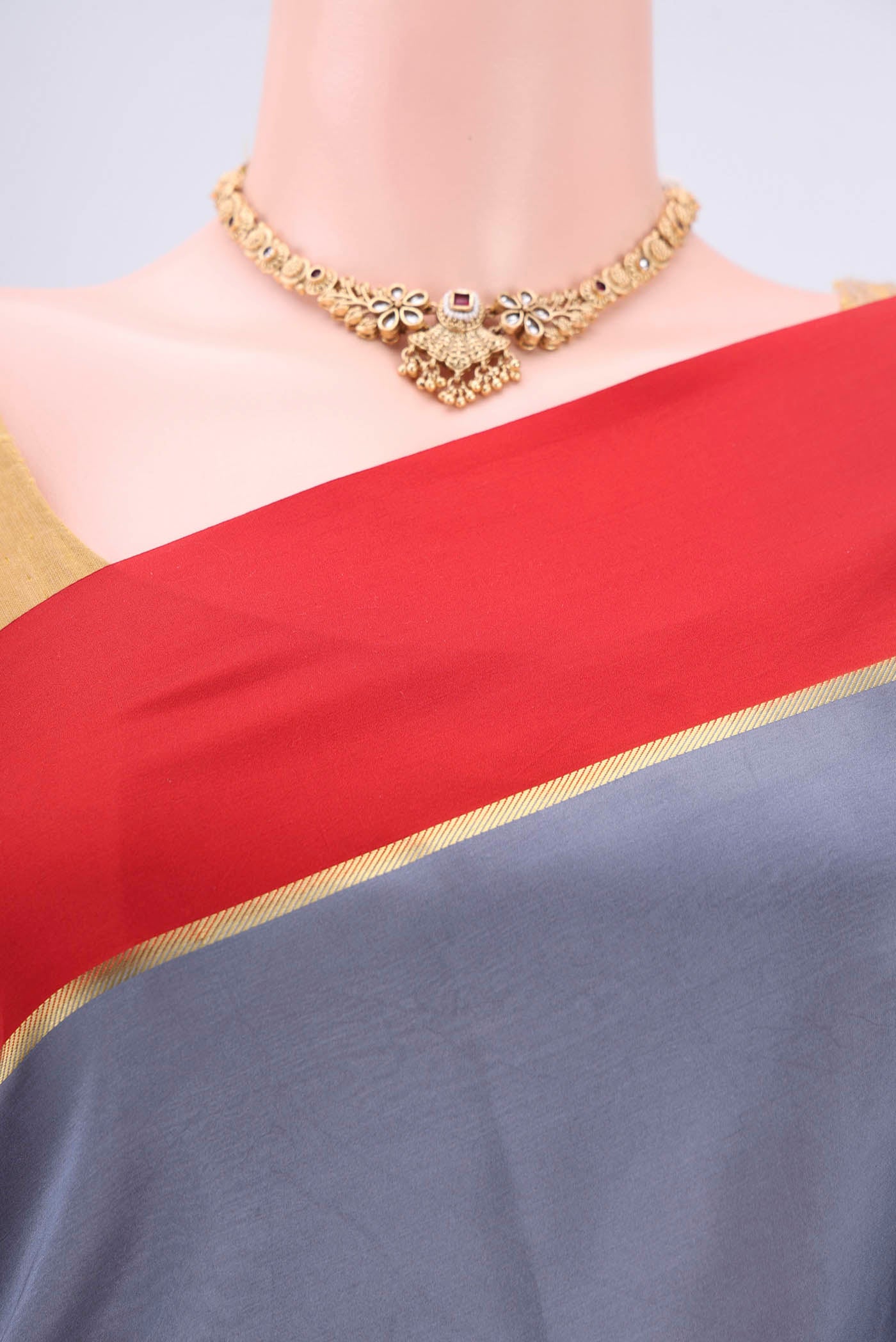 Border image of Pure Silk Pure Zari Grey Mysore Crepe Saree with Plain Body and Zari Border. 