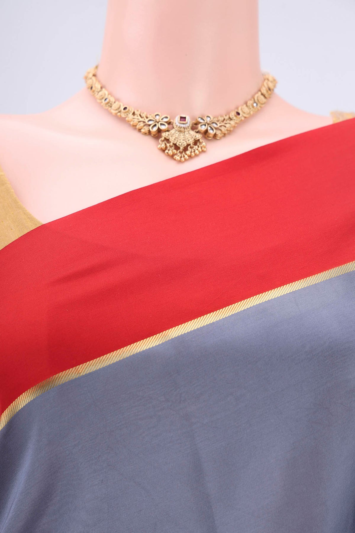 Border image of Pure Silk Pure Zari Grey Mysore Crepe Saree with Plain Body and Zari Border. 