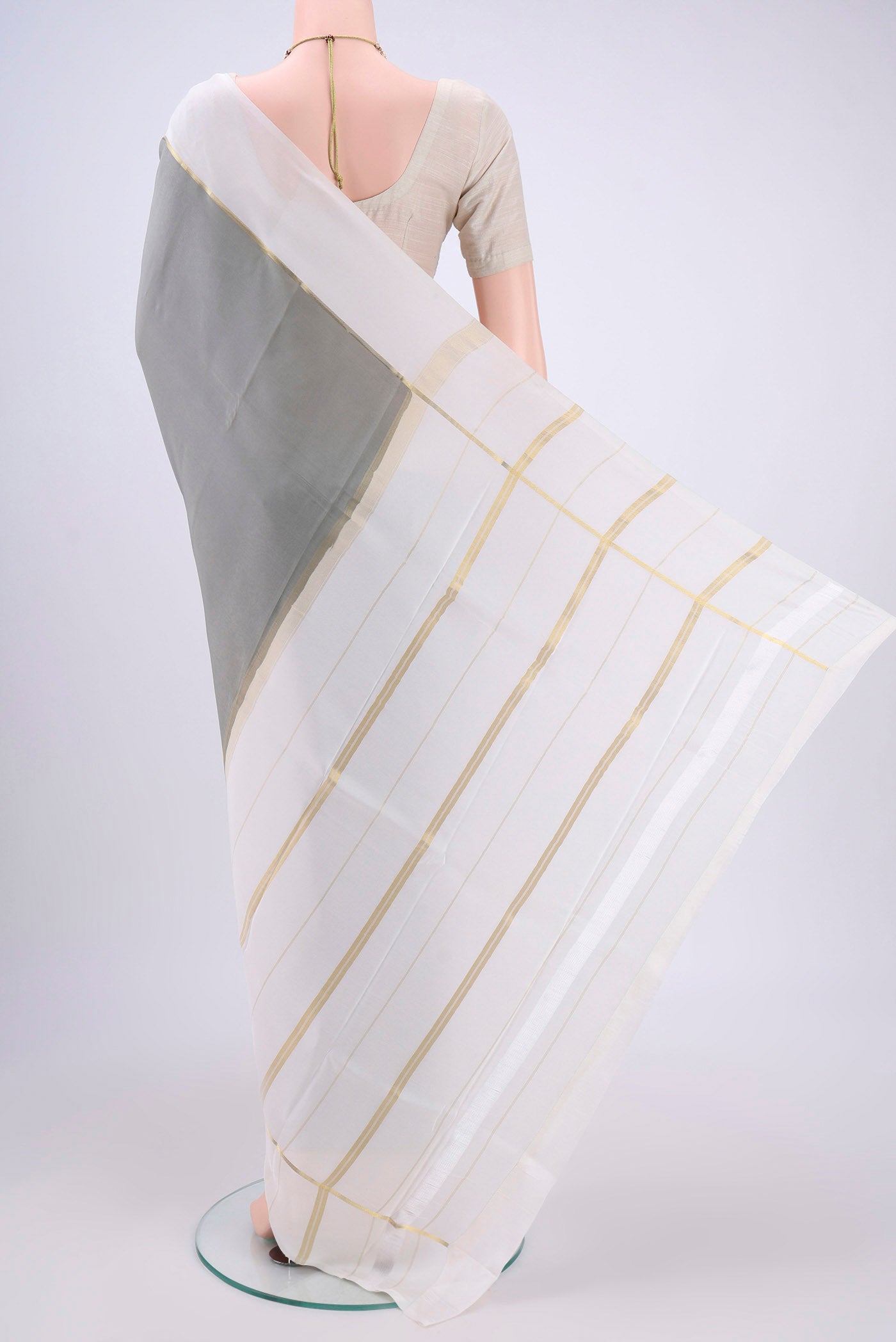 Flat view of Pure Silk Pure Zari Grey Mysore Crepe Saree with Plain Body and Zari Border. 