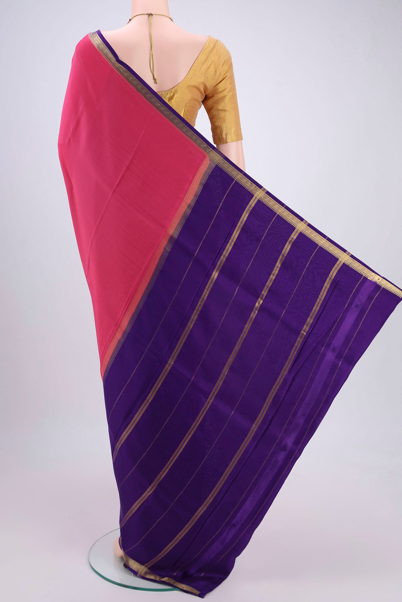 Flat view of Pure Silk Pure Zari Dark Pink Mysore Crepe Saree with Plain Body and Zari Border. 
