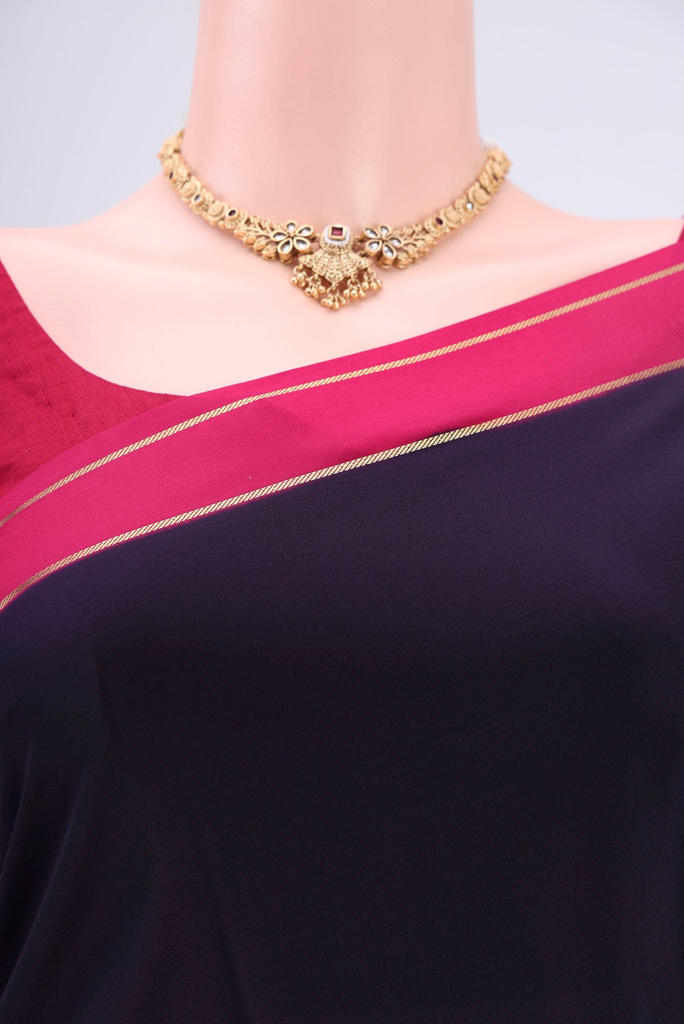 Border image of Pure Silk Pure Zari Navy Blue Mysore Crepe Saree with Plain Body and Zari Border. 