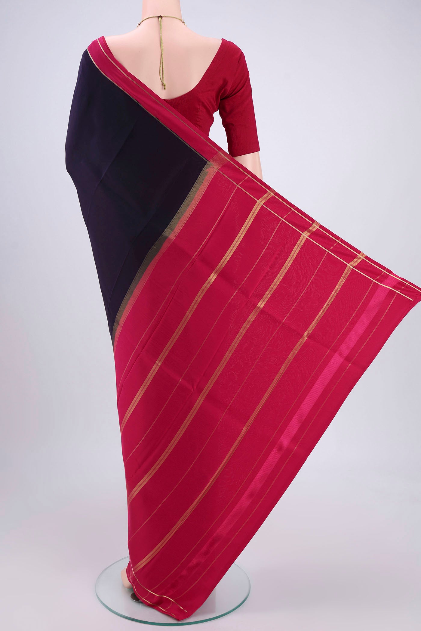 Flat view of Pure Silk Pure Zari Navy Blue Mysore Crepe Saree with Plain Body and Zari Border. 