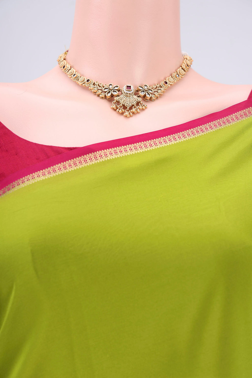 Border image of Pure Silk Pure Zari Parrot Green Mysore Crepe Saree with Plain Body and Zari Border. 