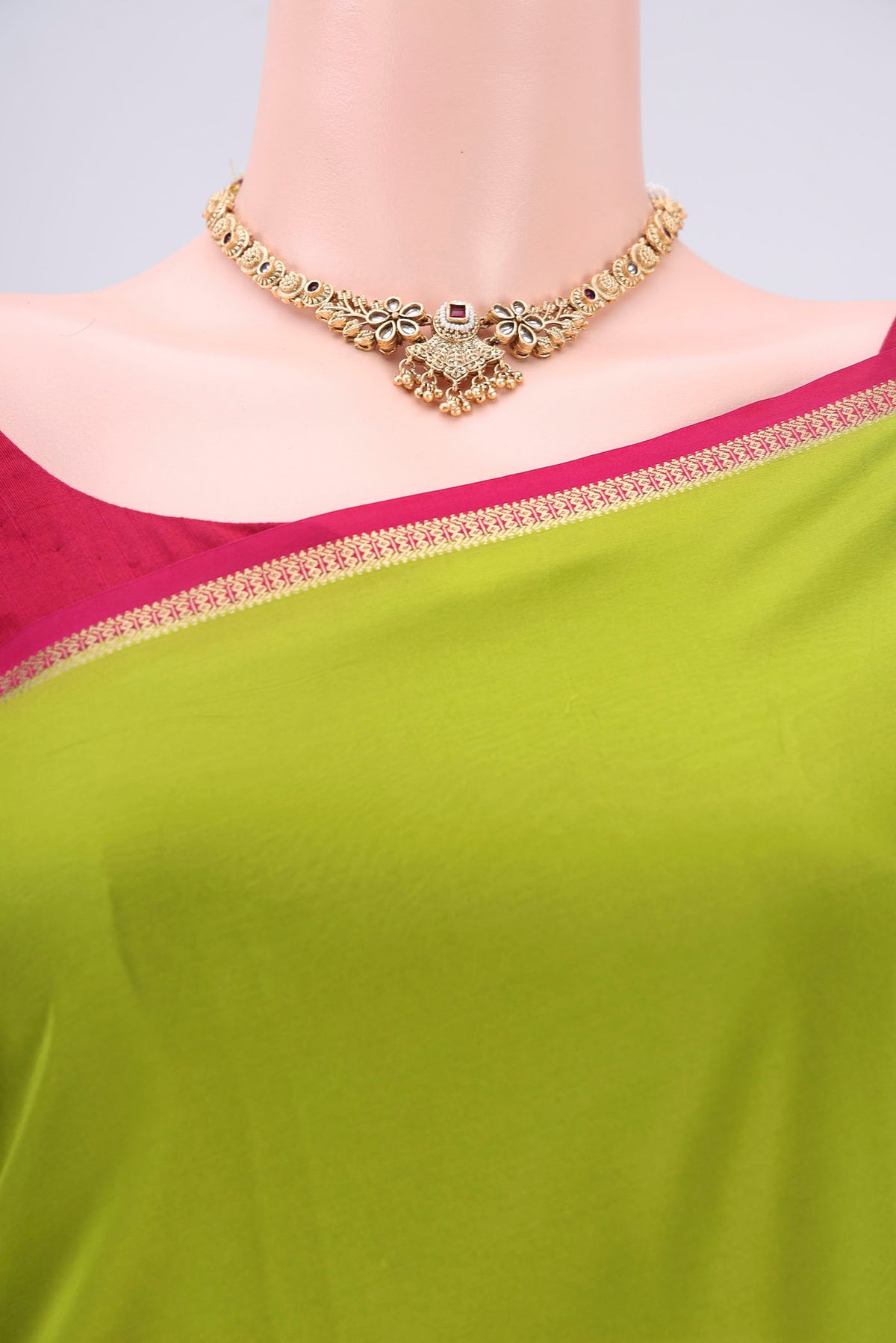 Border image of Pure Silk Pure Zari Parrot Green Mysore Crepe Saree with Plain Body and Zari Border. 