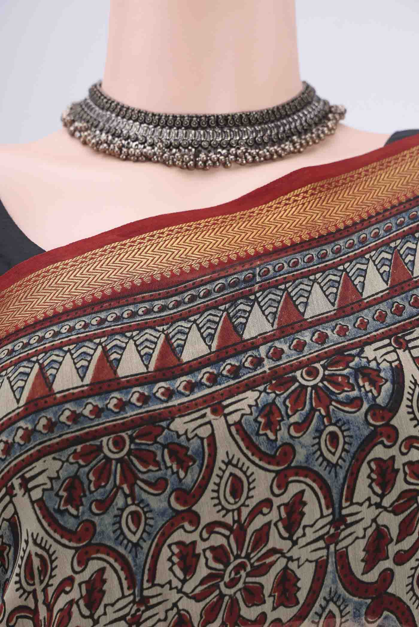 Border image of Beige Chanderi Silk Cotton Saree with Ajrakh Print on the body and Zari Border. 