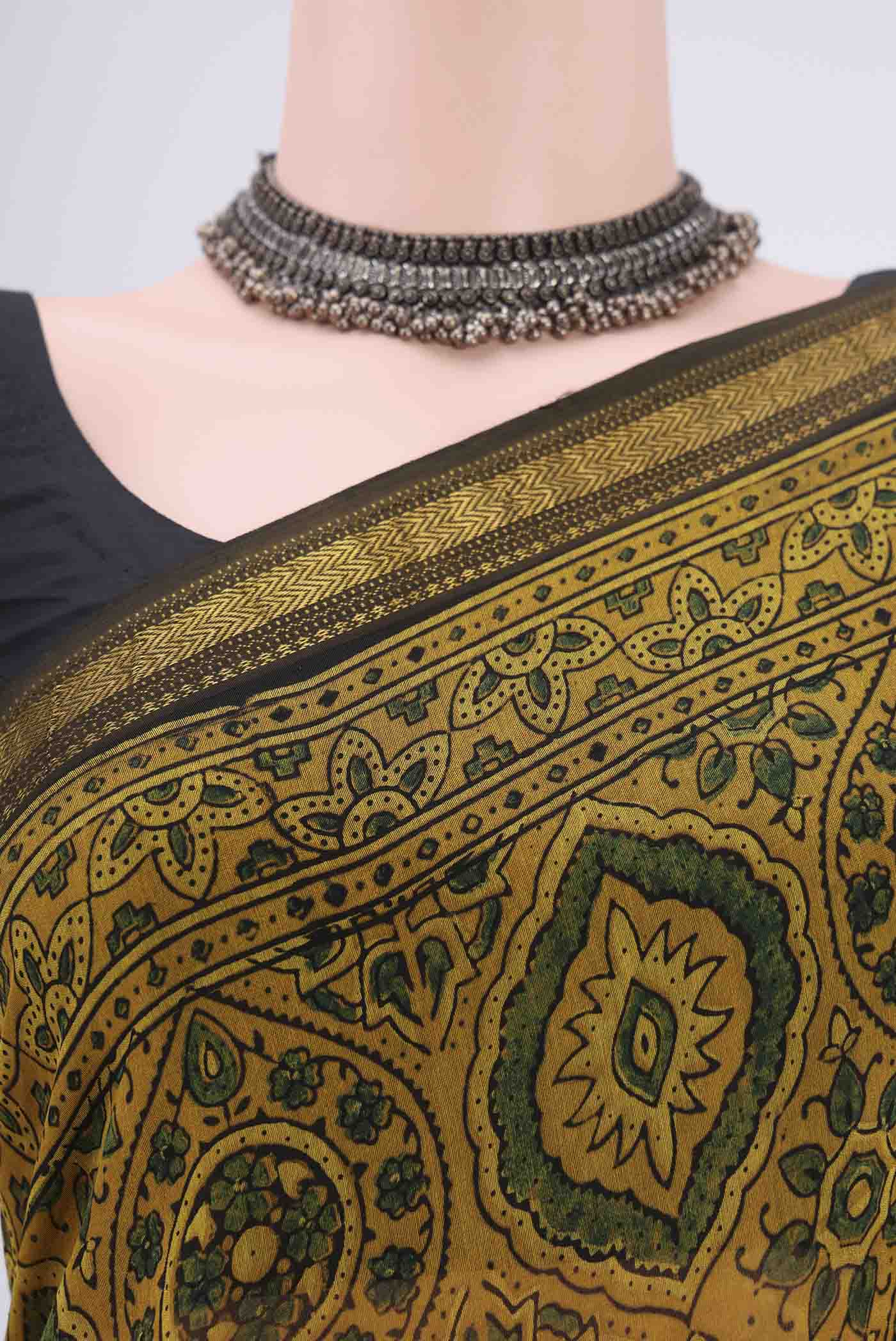Border image of Yellow Chanderi Silk Cotton Saree with Ajrakh Print on the body and Zari Border. 