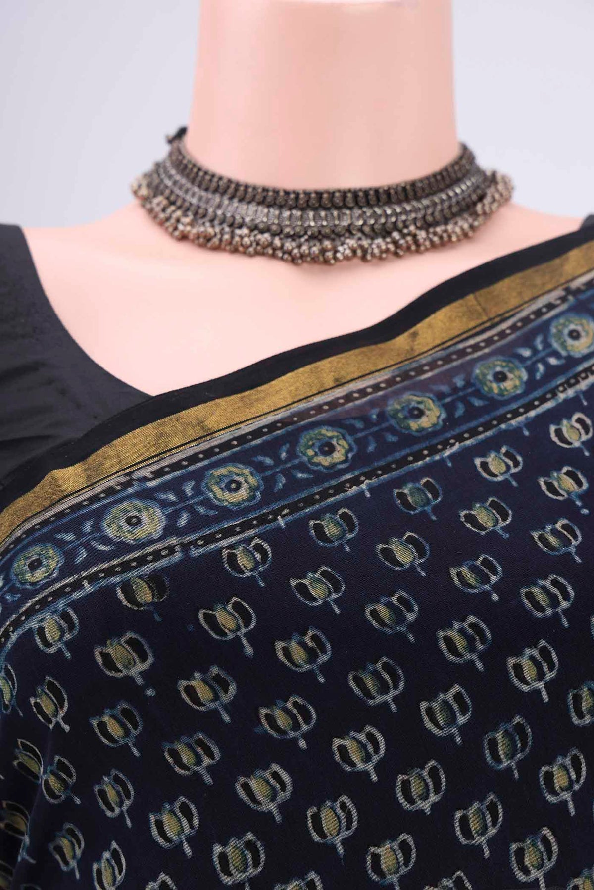 Border image of Navy Blue Chanderi Silk Cotton Saree with Ajrakh Print on the body and Zari Border. 