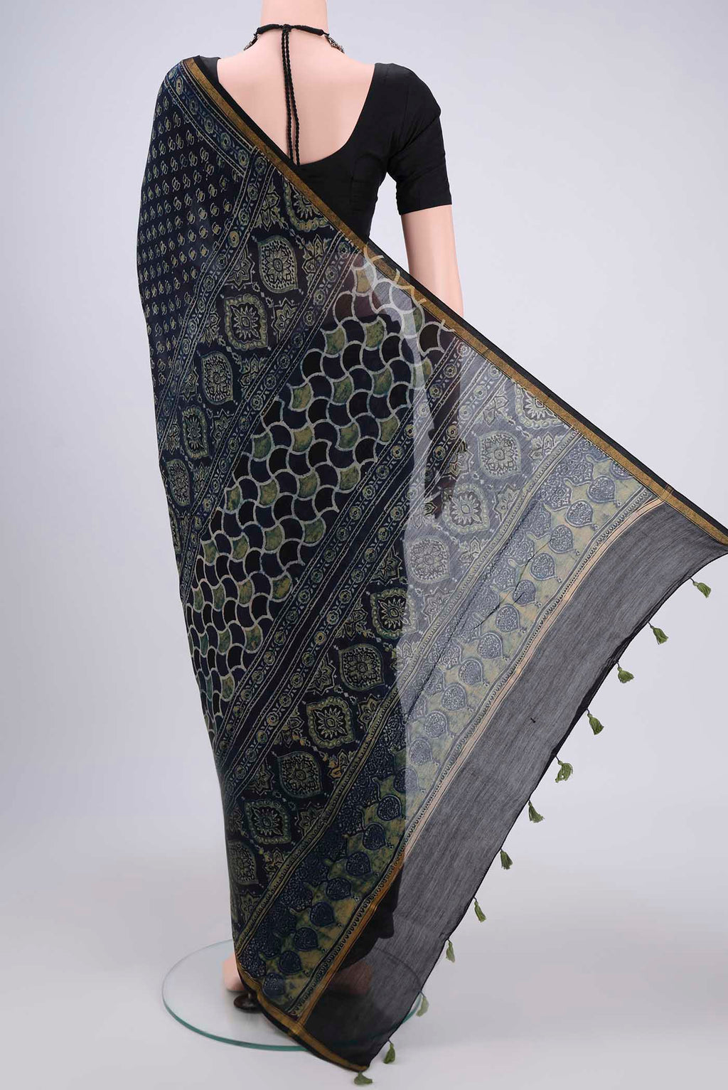Flat view of Navy Blue Chanderi Silk Cotton Saree with Ajrakh Print on the body and Zari Border. 