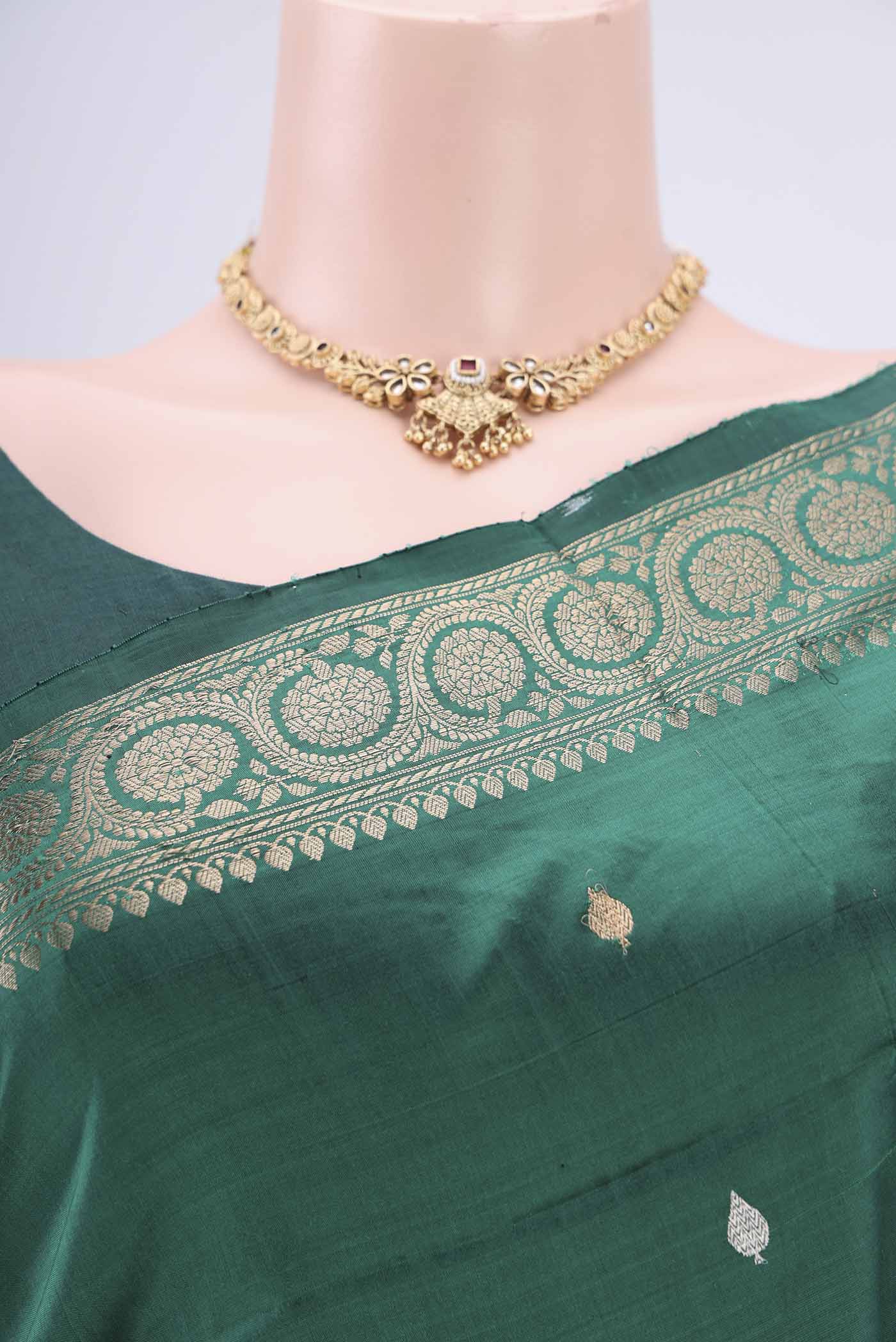 Border image of Green Banarasi Katan Silk Saree with Zari Butta on the body and Zari Border. 