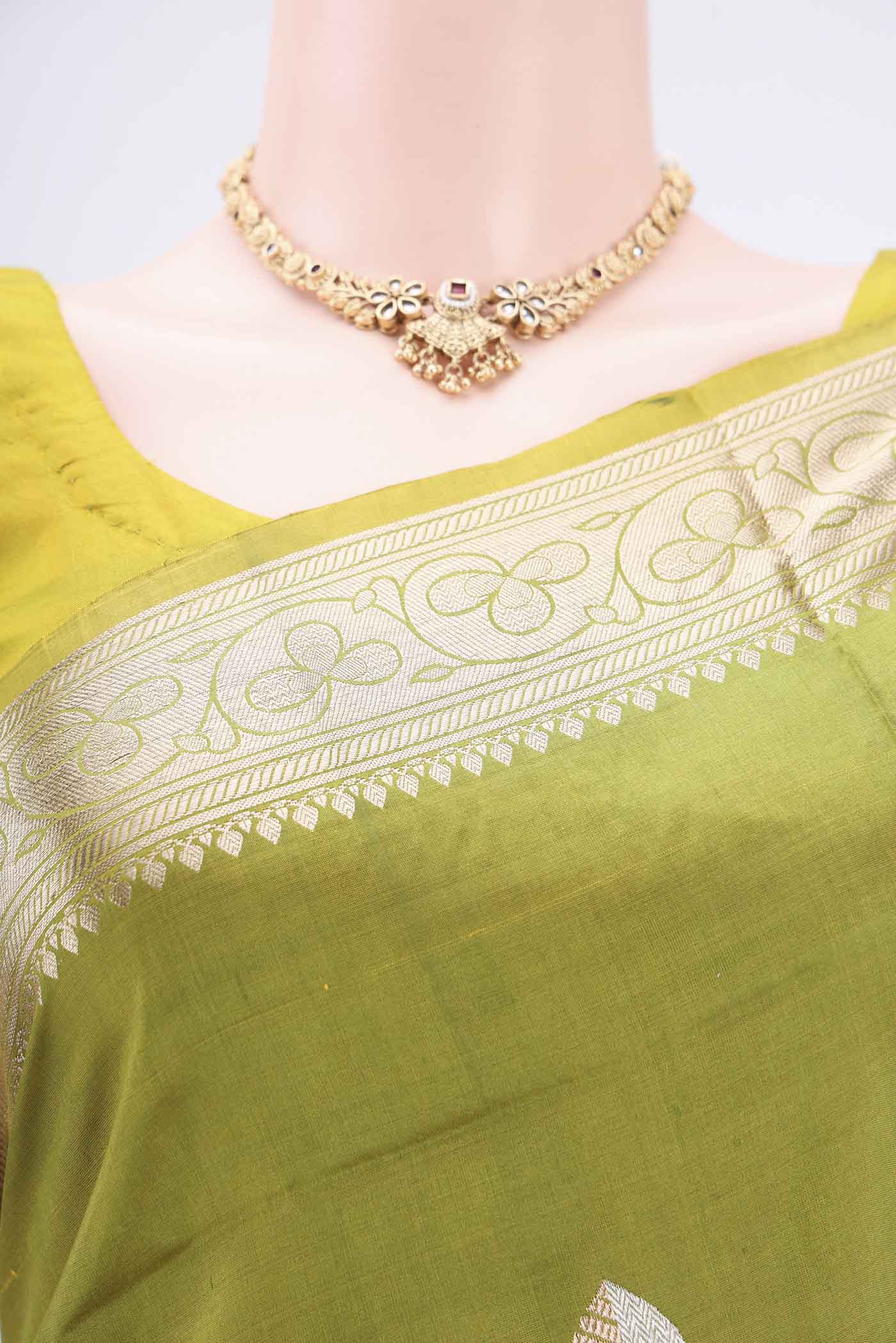 Border image of Light Green Banarasi Katan Silk Saree with Zari Butta on the body and Zari Border. 
