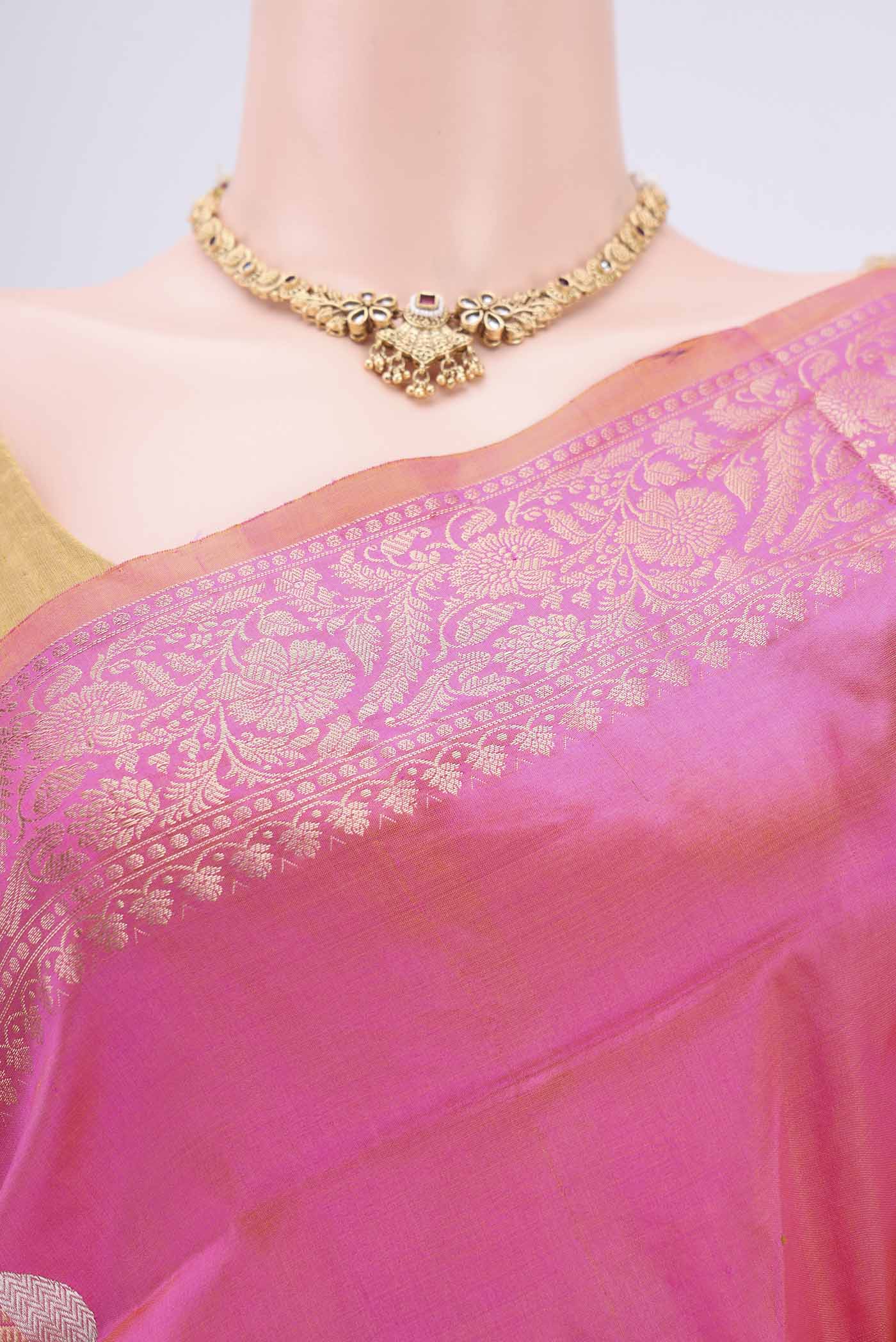 Border image of Pinkish Yellow Dual Tone Banarasi Katan Silk Saree with Zari Butta on the body and Zari Border. 