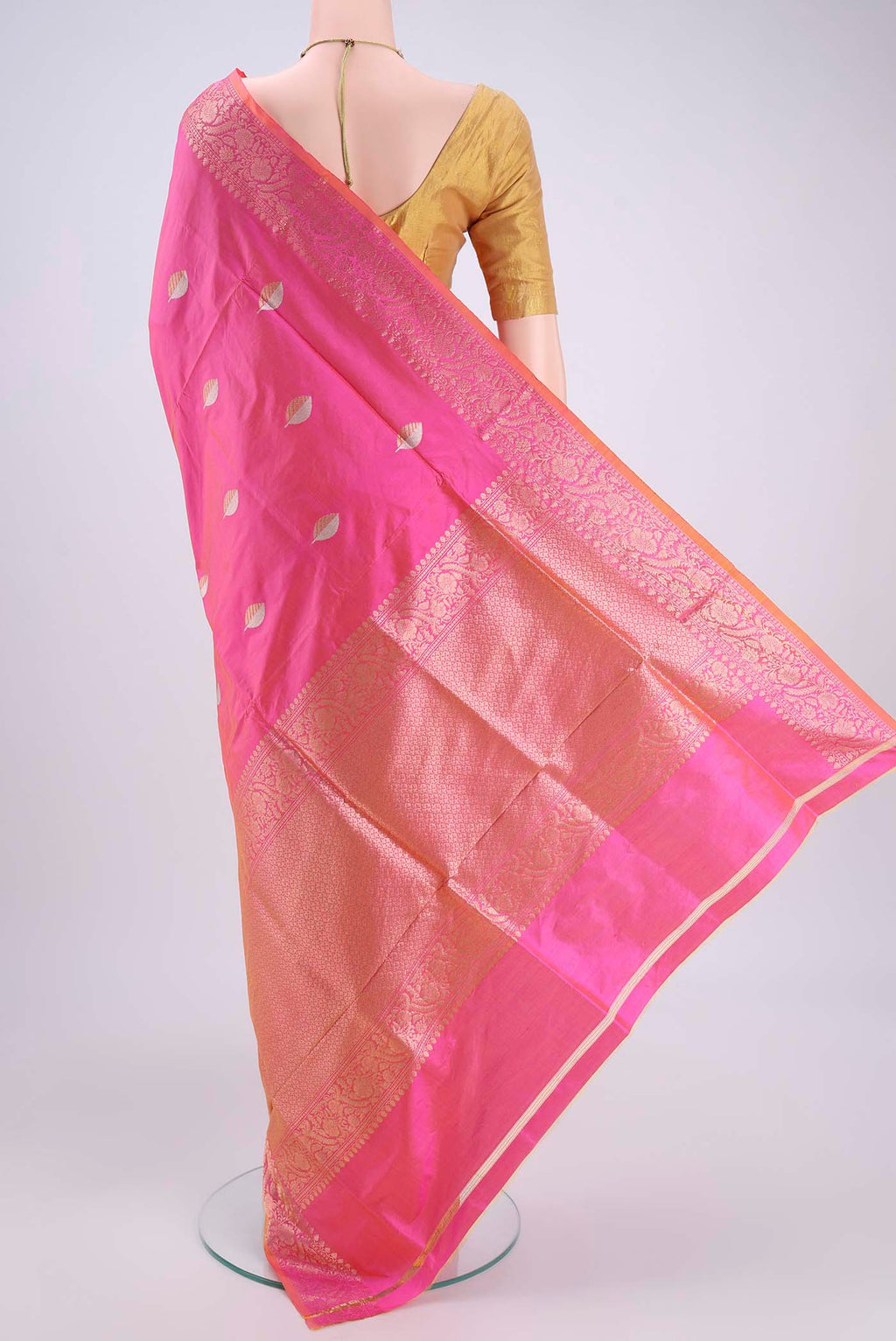 Flat view of Pinkish Yellow Dual Tone Banarasi Katan Silk Saree with Zari Butta on the body and Zari Border. 