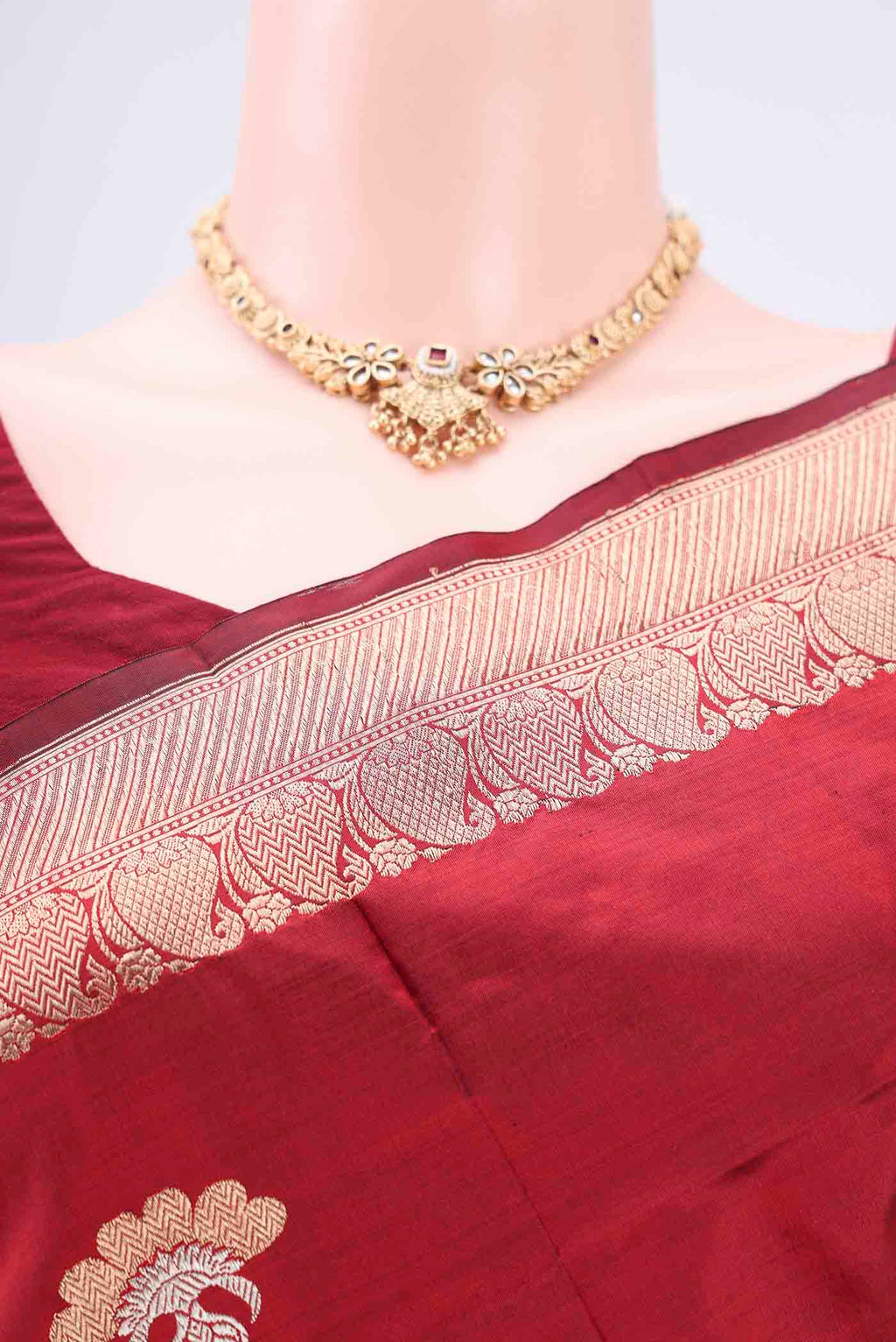 Border image of Maroon Banarasi Katan Silk Saree with Zari Butta on the body and Zari Border. 