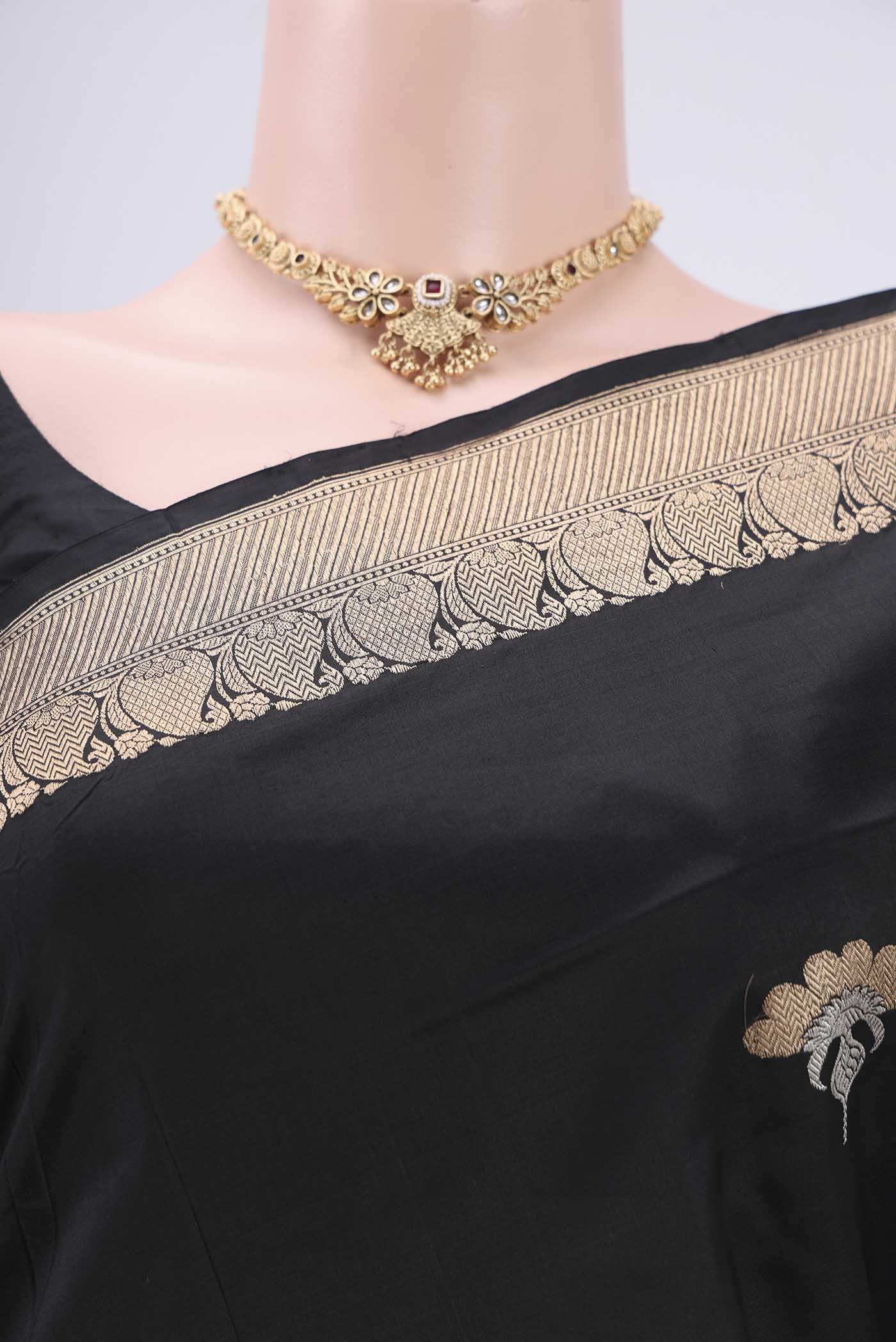 Border image of Black Banarasi Katan Silk Saree with Zari Butta on the body and Zari Border. 