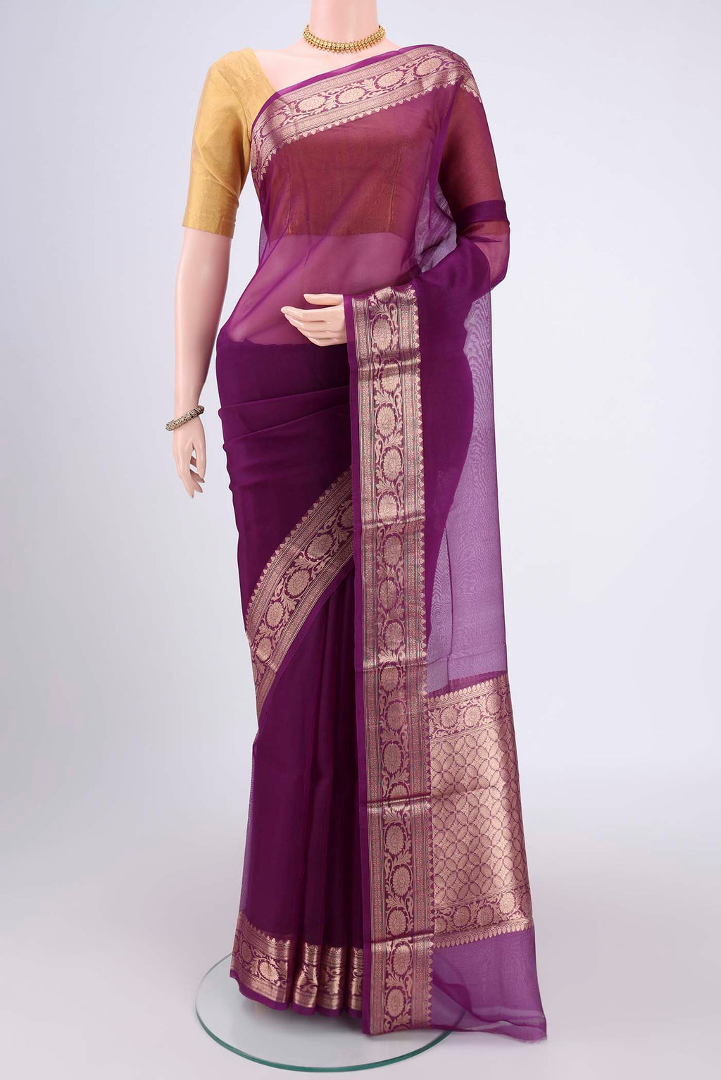 Purple Organza Silk Saree with Plain Body and Zari Border.  displayed on a mannequin