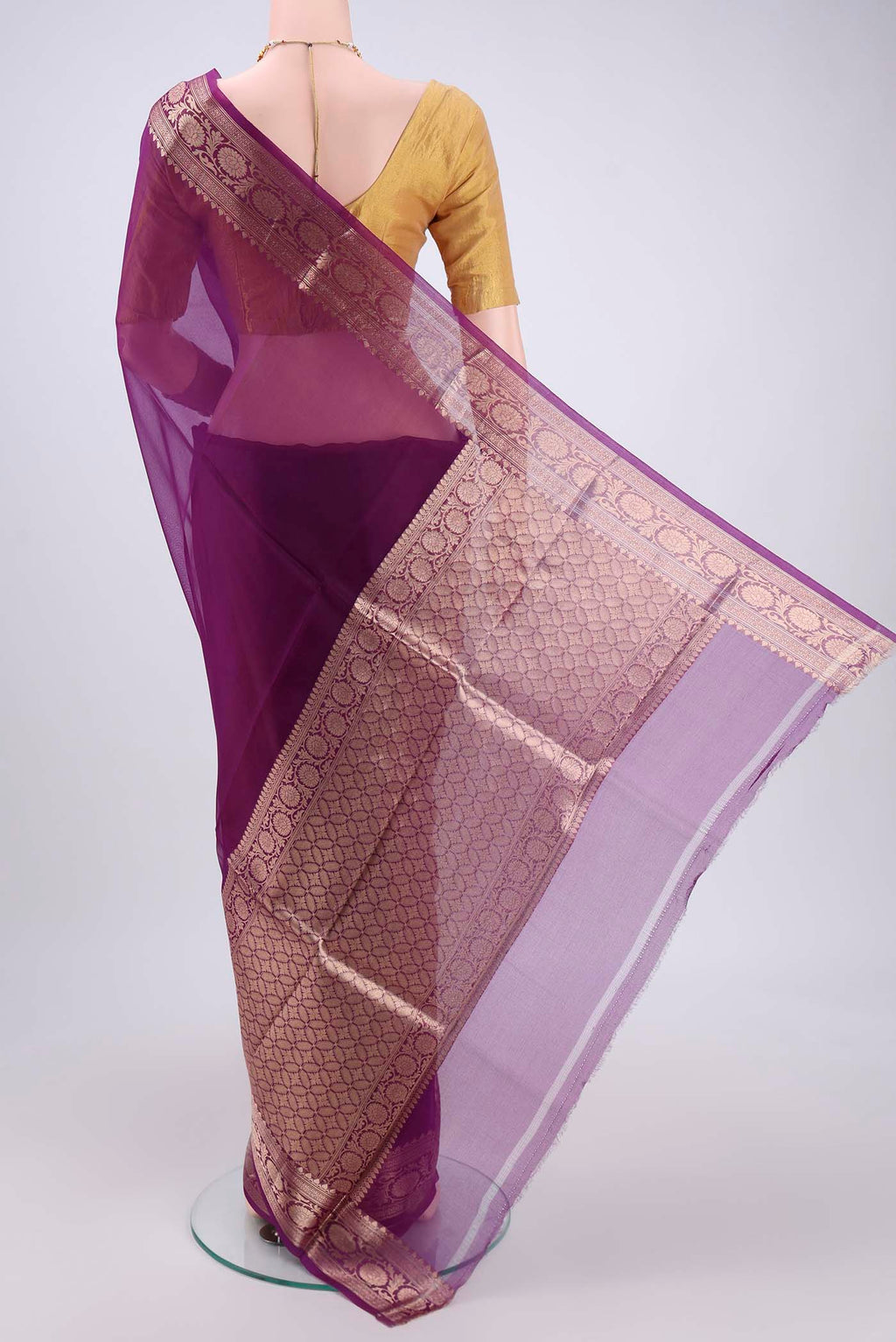 Flat view of Purple Organza Silk Saree with Plain Body and Zari Border. 