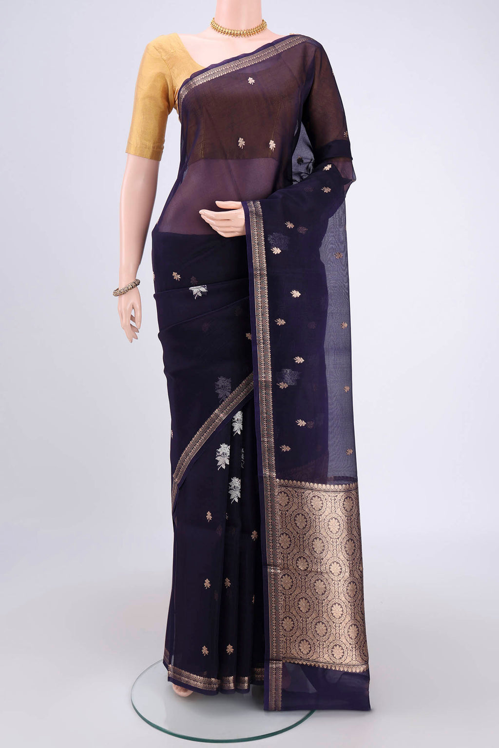 Purple Organza Silk Saree with Plain Body and Zari Border.  displayed on a mannequin