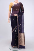 Purple Organza Silk Saree with Plain Body and Zari Border.  displayed on a mannequin