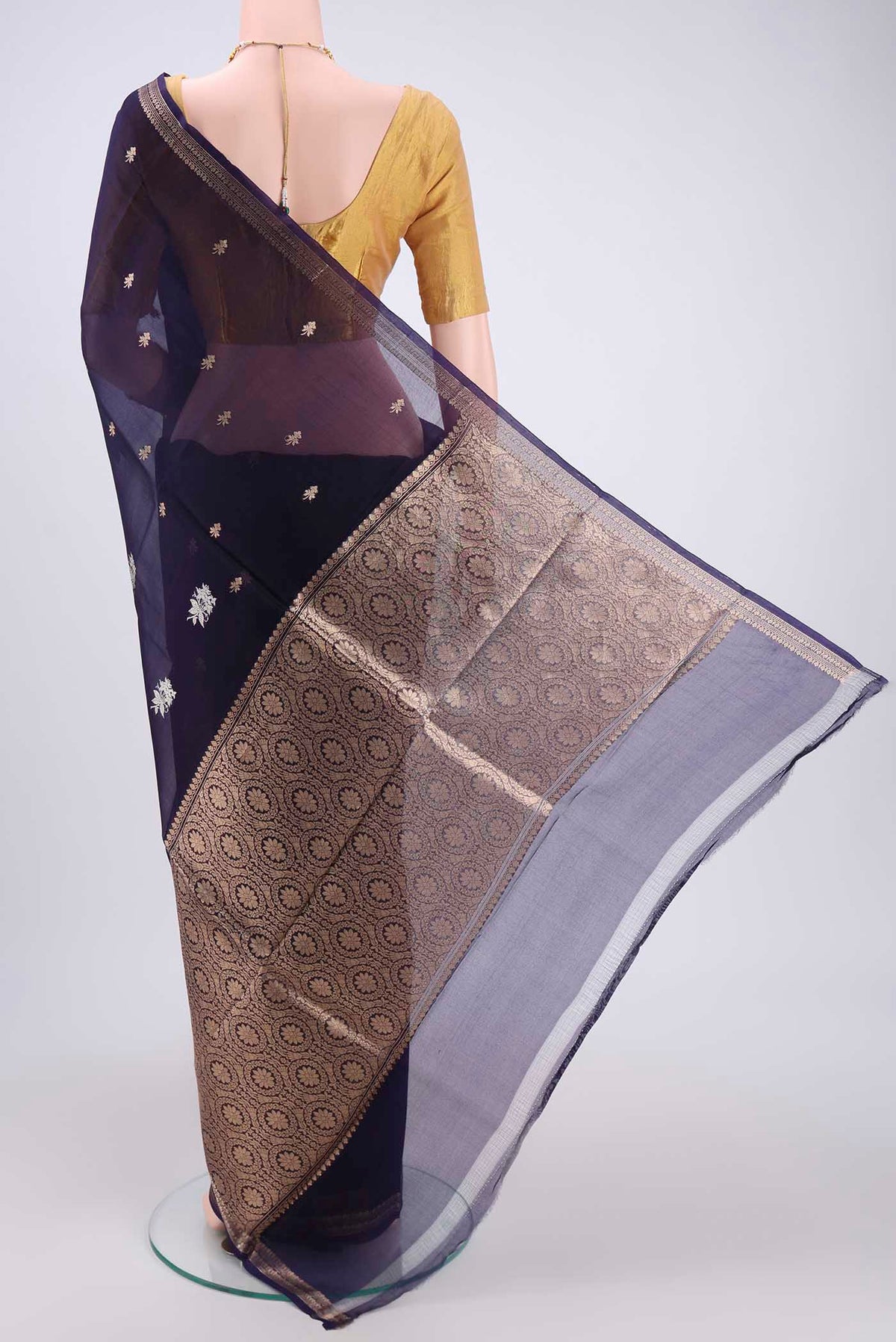 Flat view of Purple Organza Silk Saree with Plain Body and Zari Border. 
