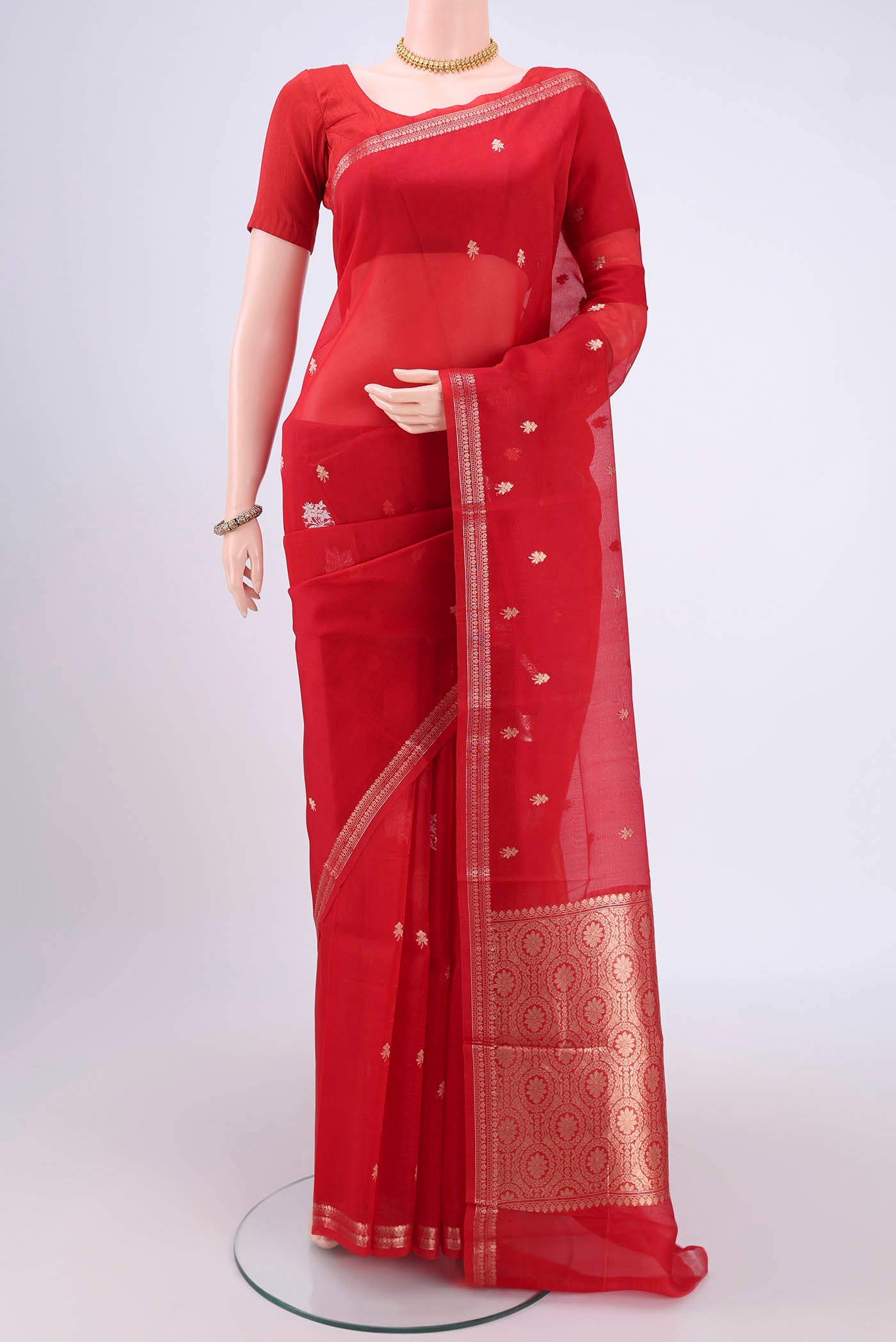 Red Organza Silk Saree with Plain Body and Zari Border.  displayed on a mannequin
