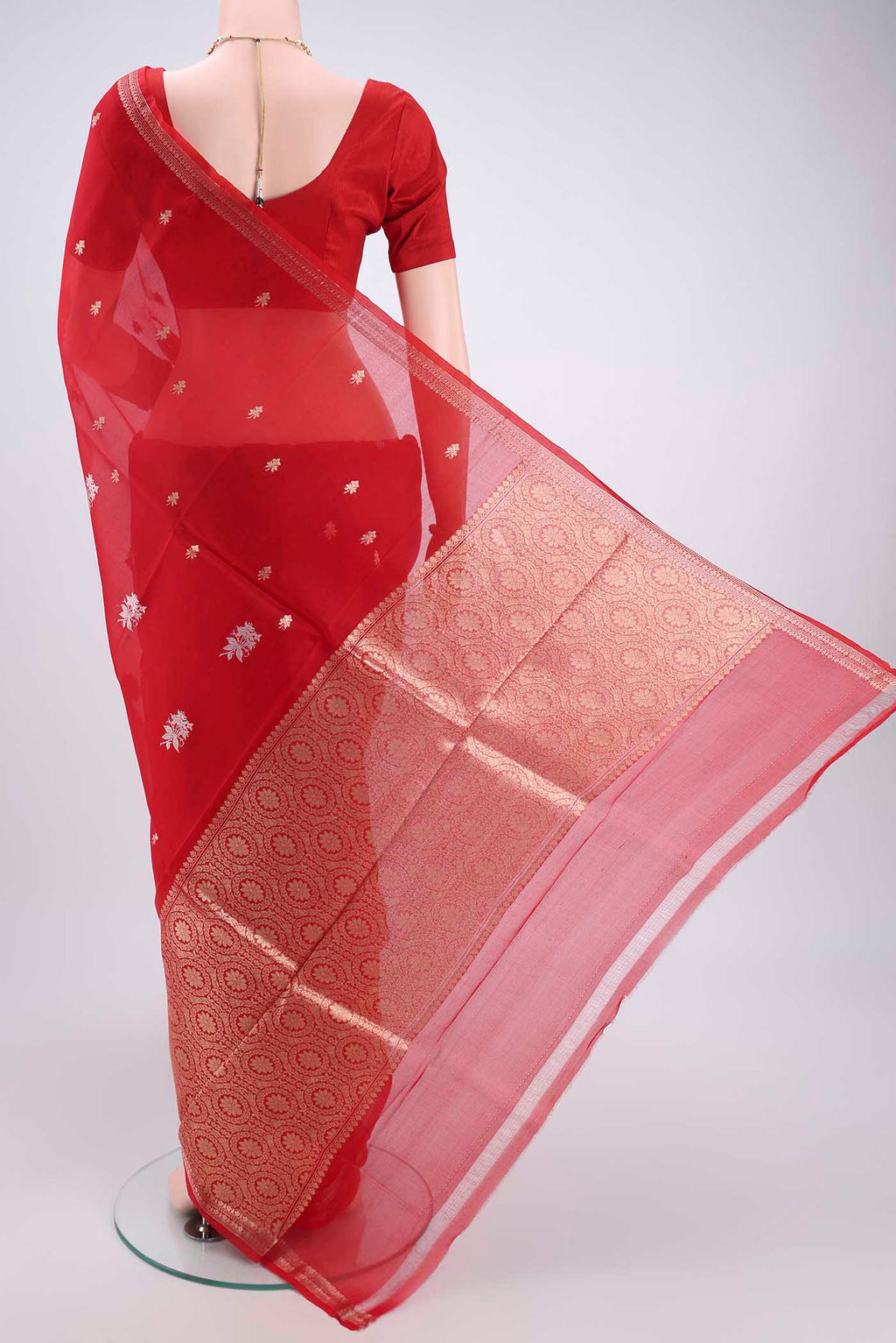 Flat view of Red Organza Silk Saree with Plain Body and Zari Border. 