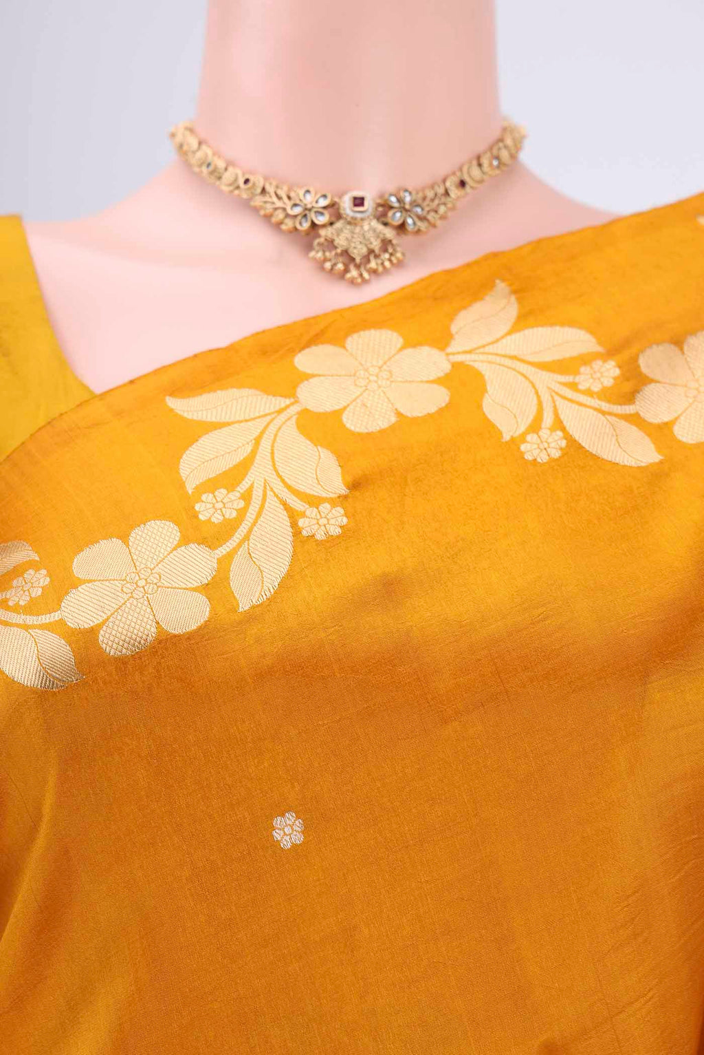 Border image of Mustard Banarasi Katan Silk Saree with Zari Butta on the body and Zari Border. 