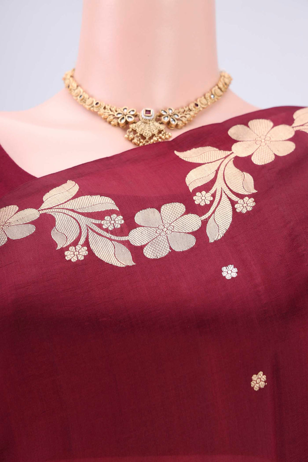 Border image of Maroon Banarasi Katan Silk Saree with Zari Butta on the body and Zari Border. 