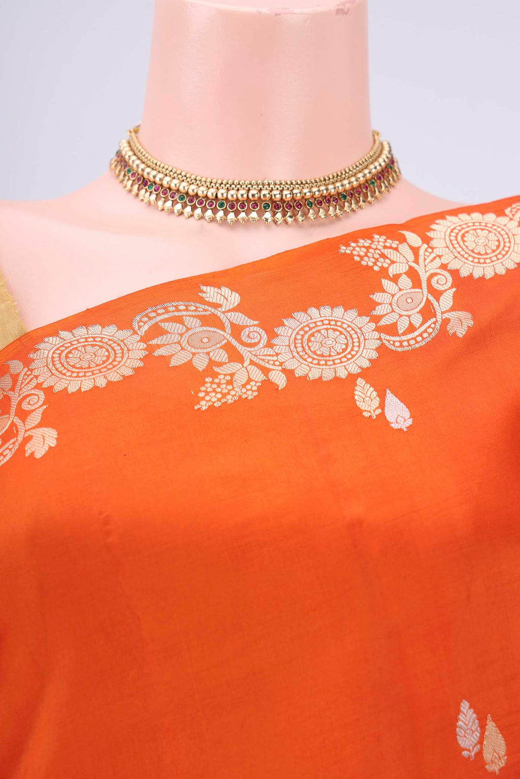 Border image of Rust Banarasi Katan Silk Saree with Zari Butta on the body and Zari Border. 