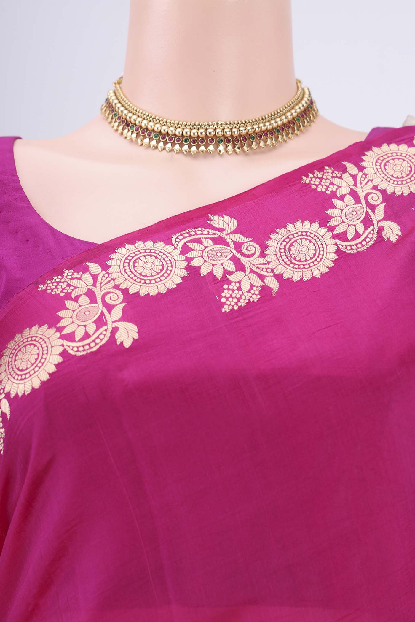 Border image of Rani Pink Banarasi Katan Silk Saree with Zari Butta on the body and Zari Border. 