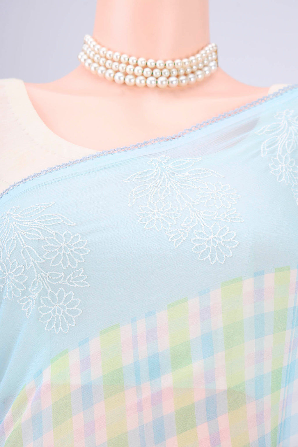 Border image of Sky Blue Mysore Chiffon Saree with Checked design on the body and Thread Border. 